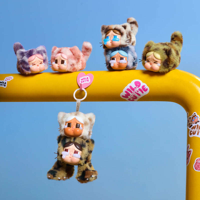 POP MART Crybaby Wild but Cutie Series Vinyl Plush Pendant Blind Box, featuring animal-costumed vinyl plush keychains in various colors with signature Crybaby faces.