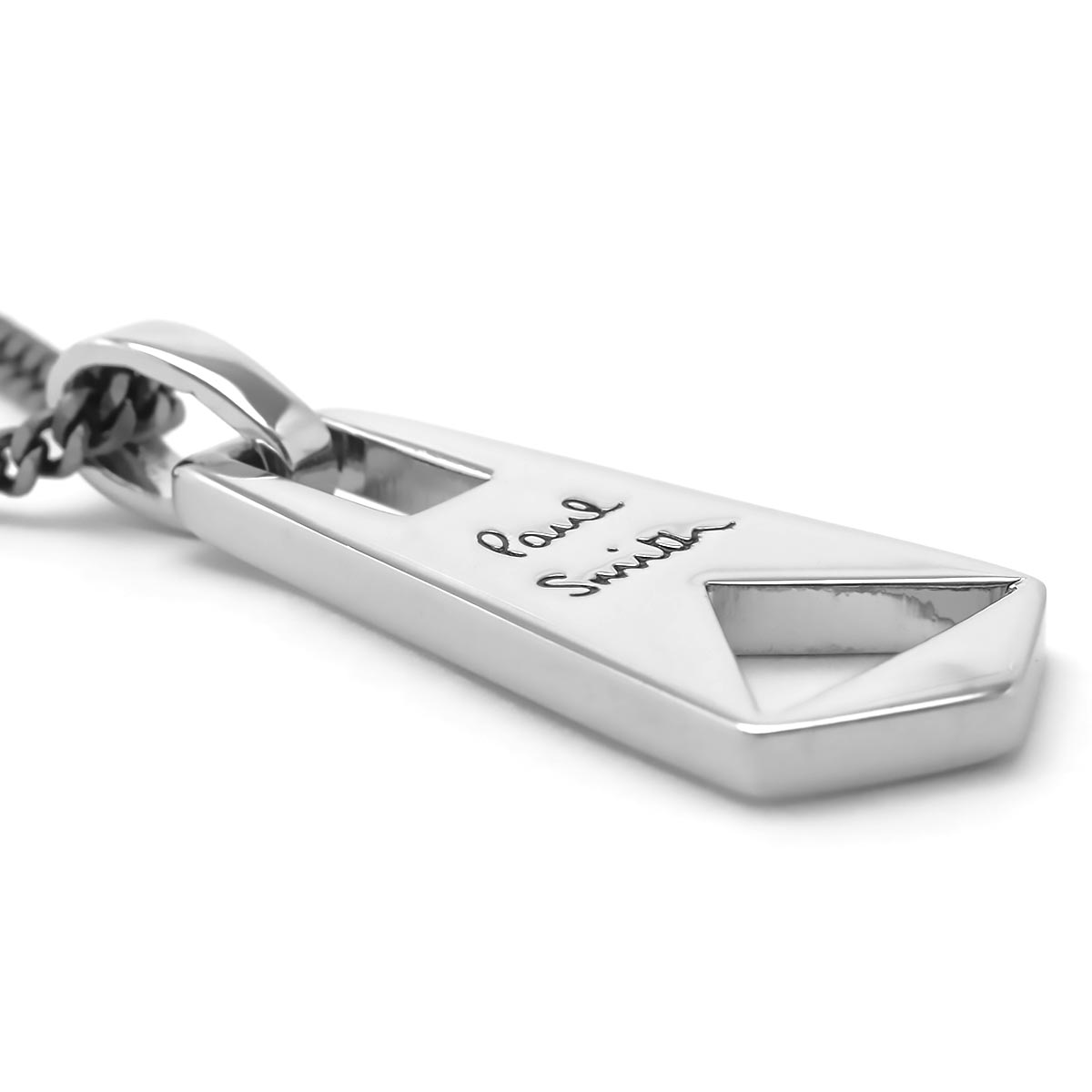 Paul Smith silver-tone unisex necklace with engraved zip puller pendant on an adjustable curb chain.