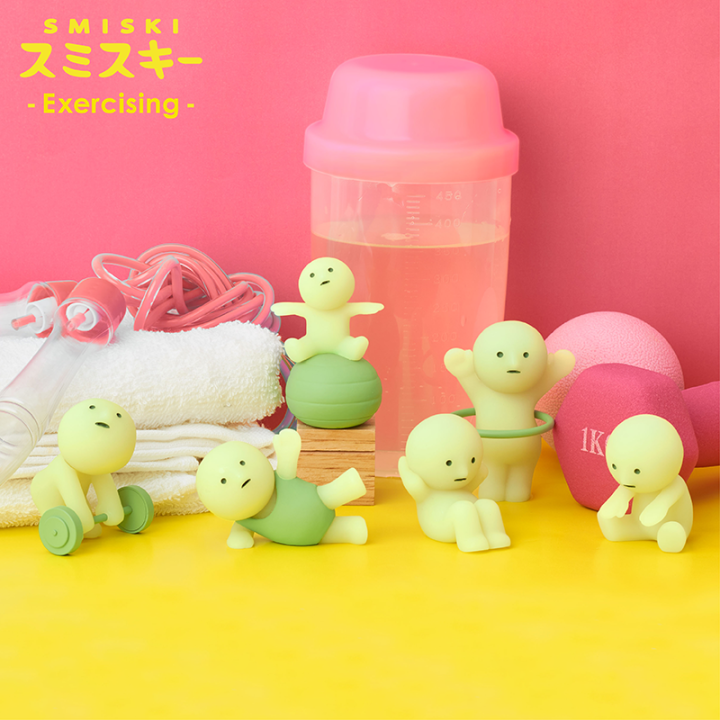 Smiski collectible figure, glow-in-the-dark mini character in quirky poses, perfect for shelves and desks.