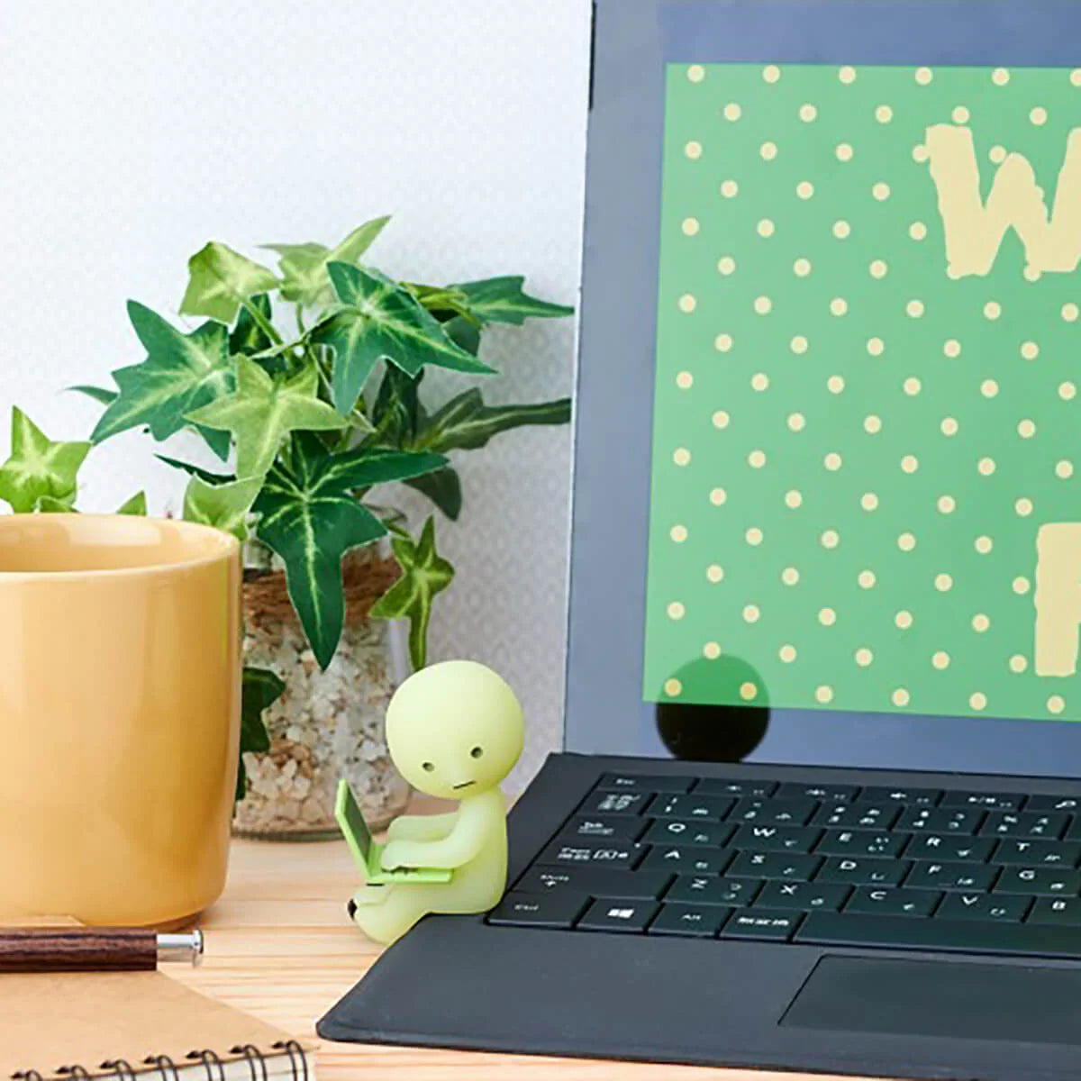 Smiski collectible figure, glow-in-the-dark mini character in quirky poses, perfect for shelves and desks.