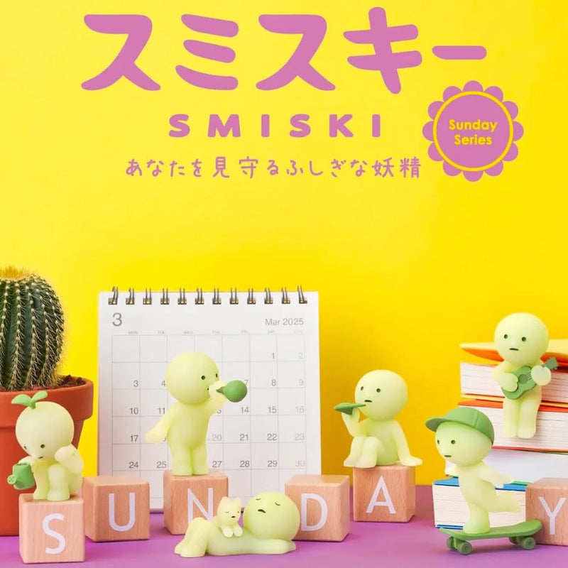Smiski Sunday Series blind box with glow-in-the-dark figure sitting and holding a paper airplane, part of 6 collectible relaxing poses.