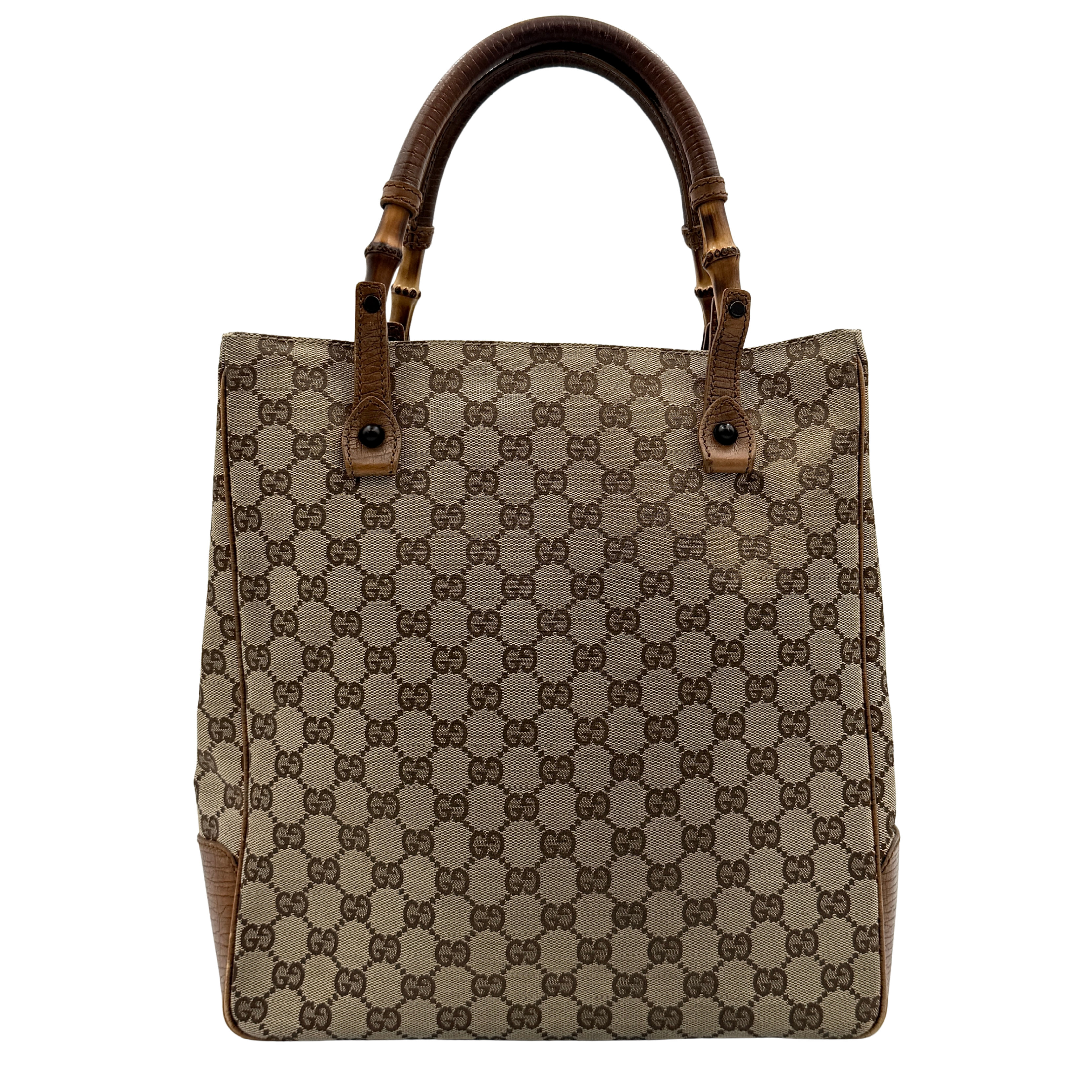 Gucci GG Monogram Bamboo Shoulder Bag in beige and brown canvas with bamboo top handles displayed upright.