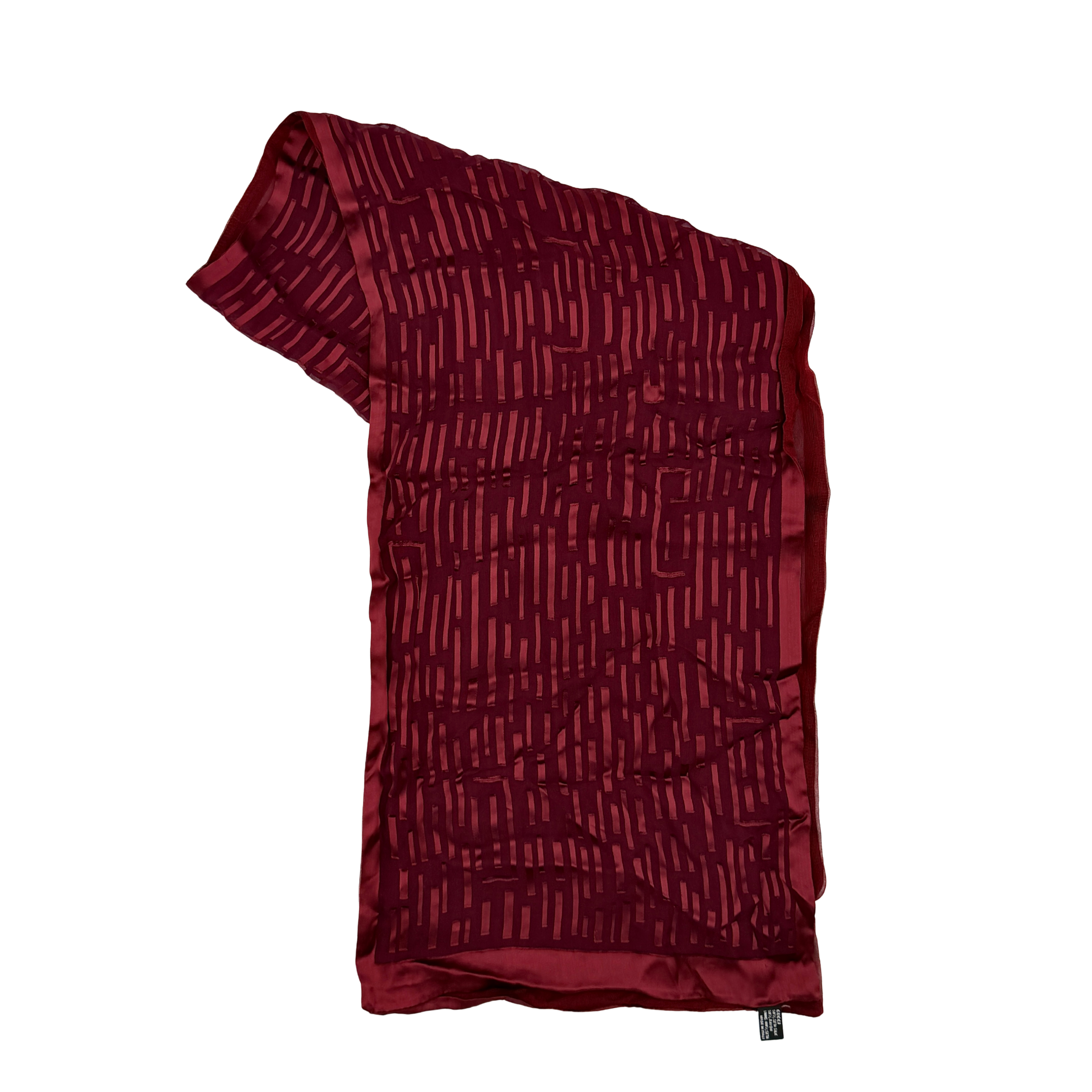 A maroon Gucci silk scarf with a tonal geometric jacquard pattern and a lustrous silk border, elegantly displayed to highlight its texture.