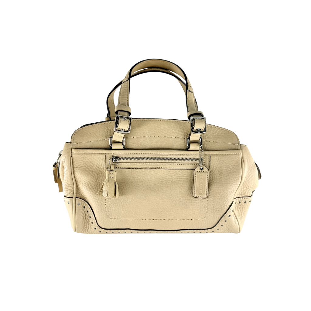 Coach Hampton Sand Satchel in beige pebbled leather with structured dual handles, front zip pocket, and silver-tone hardware.