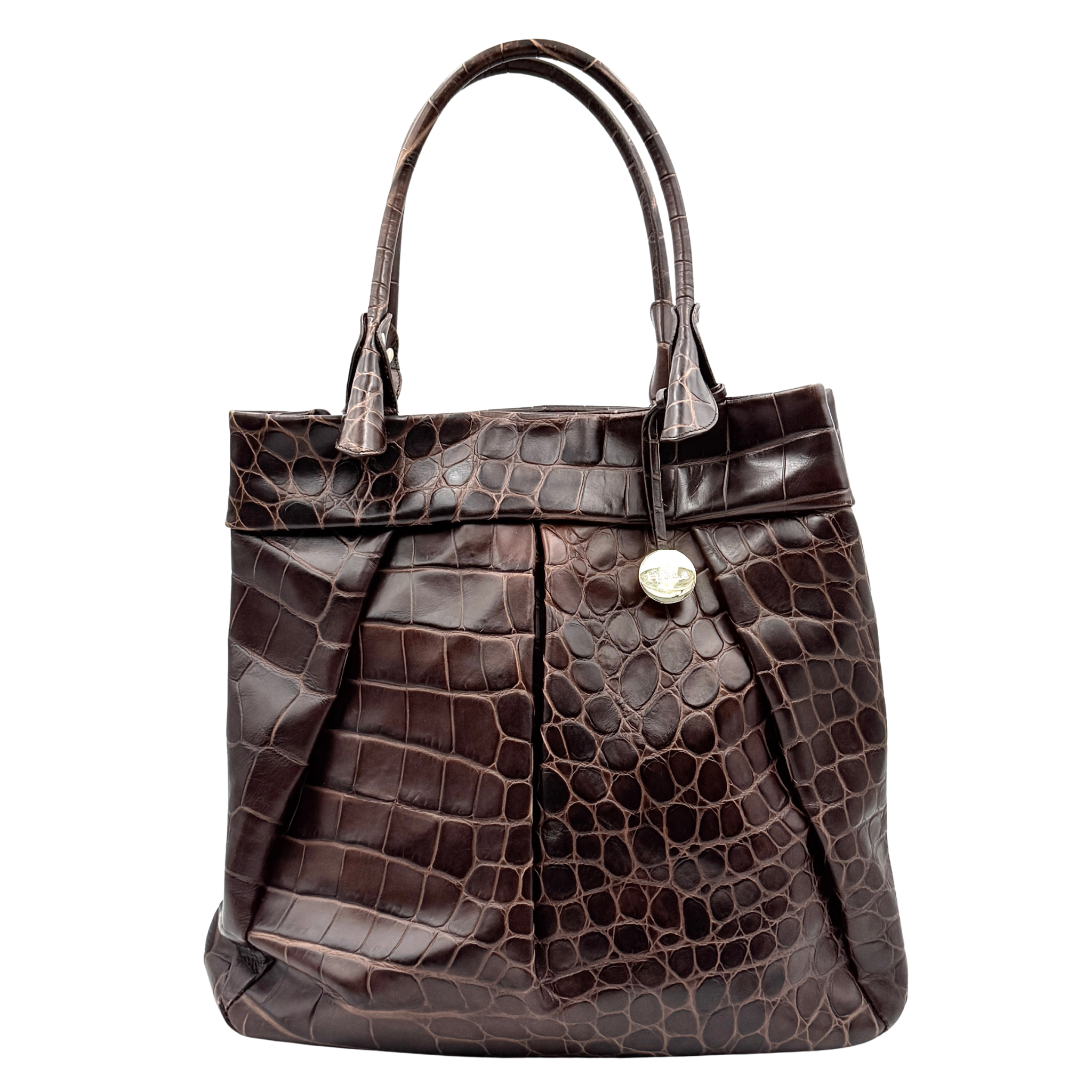 Furla dark brown croc-embossed leather tote bag with gold logo charm, structured silhouette, and double handles.