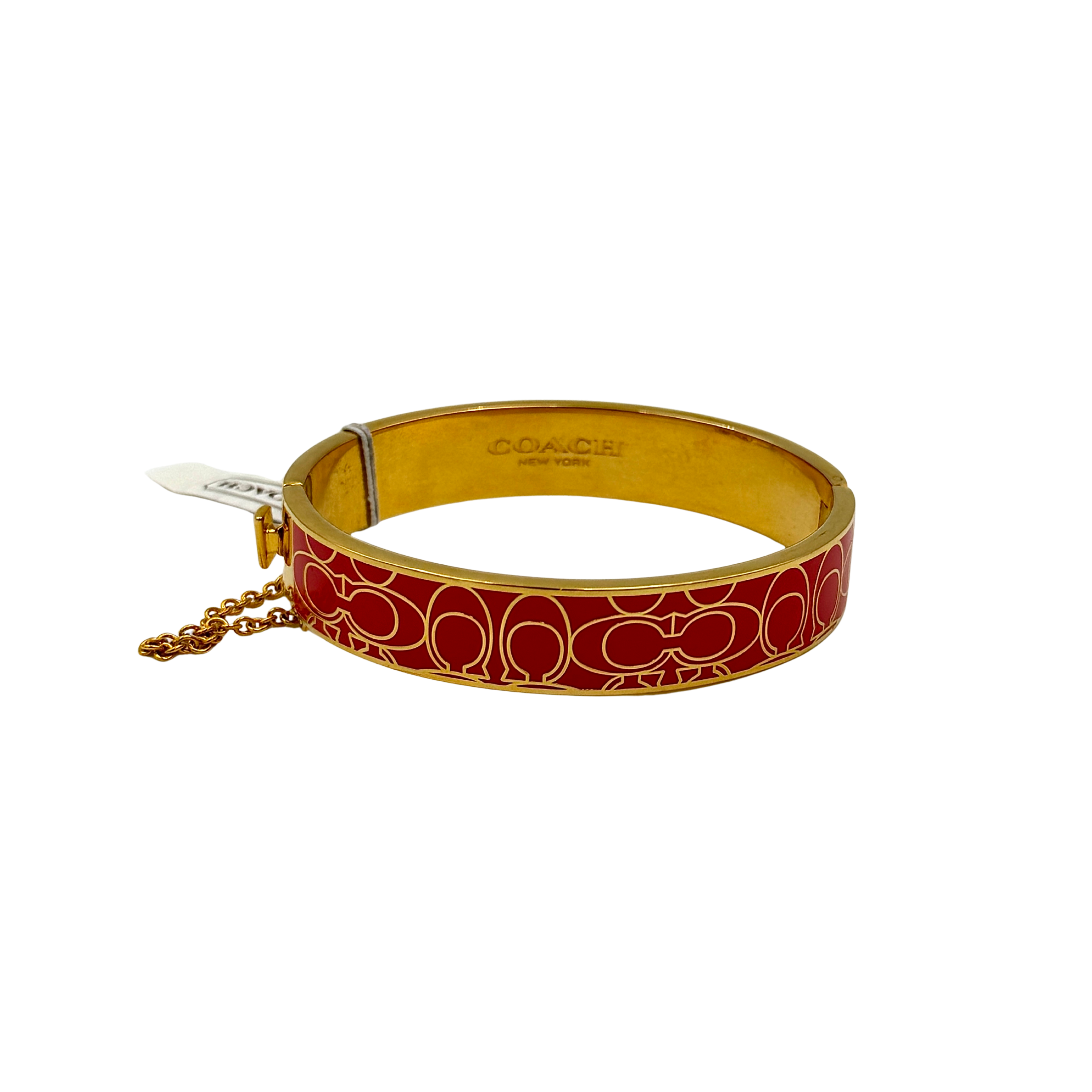 Coach Signature C Bangle Bracelet in gold-tone metal with red enamel, featuring the signature C motif and safety chain.
