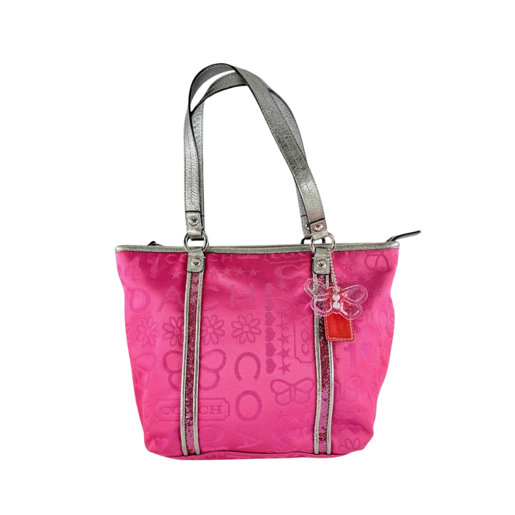 Coach Poppy Bandana Glitter Graffiti Tote Bag in vibrant pink with metallic silver handles, adorned with glitter accents and butterfly charm.