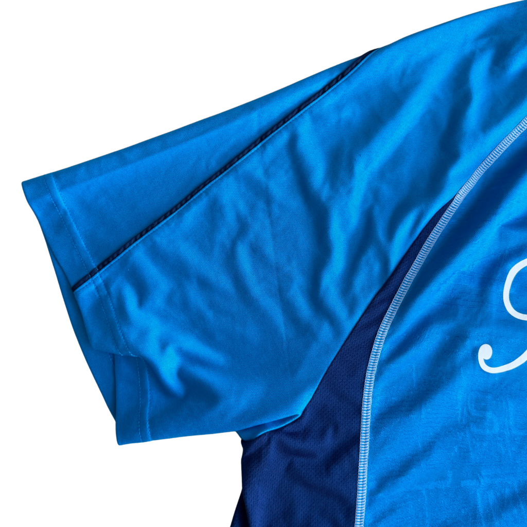 Supreme Jacquard Soccer Jersey in blue with front Supreme script and patch, navy side panels, and sporty detailing.