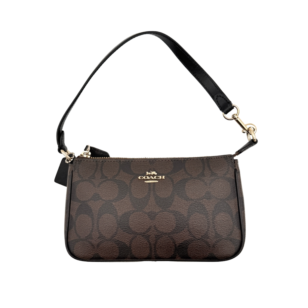 Coach Signature Nolita 19 shoulder bag in brown monogram canvas with black leather strap and gold-tone hardware, shown against a white background.