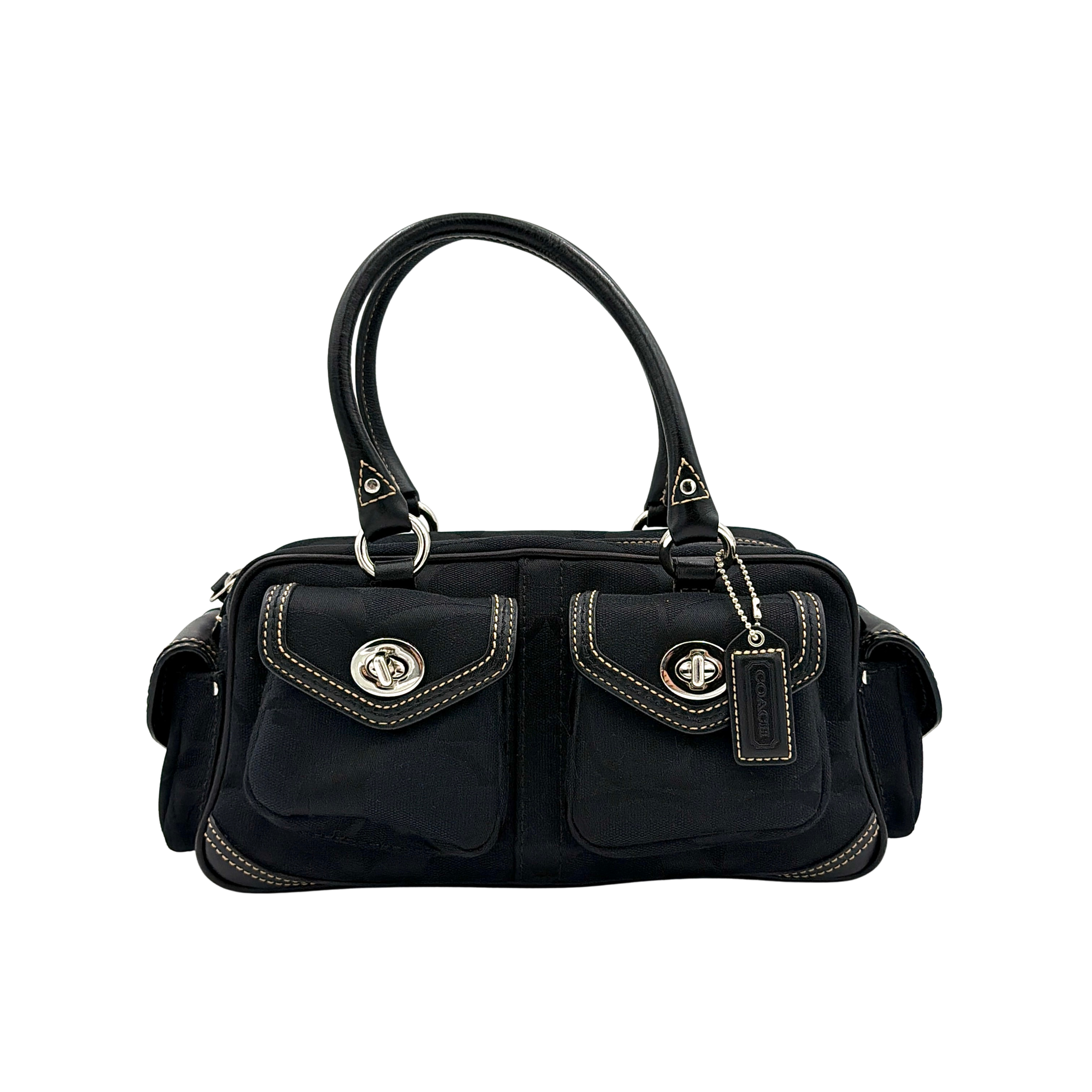 Coach black Signature Gallery satchel with double handles and silver hardware, set against a clean background.