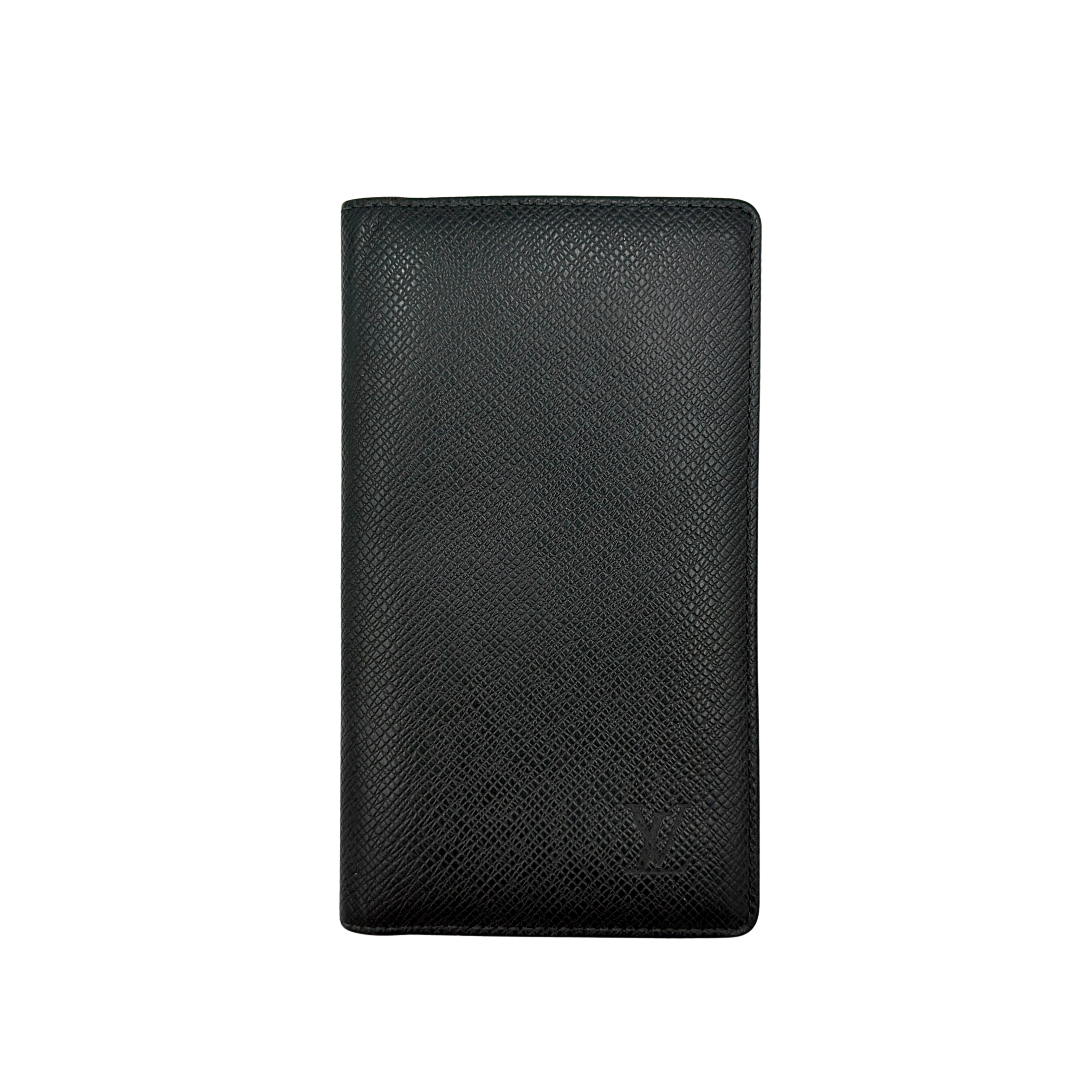 A Louis Vuitton Taiga Brazza Wallet in dark green, showcasing fine cross-grain leather texture and the understated LV monogram debossed on the front.