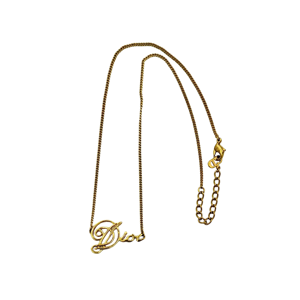 Dior gold logo letter necklace featuring an elegant script pendant on a fine gold chain.