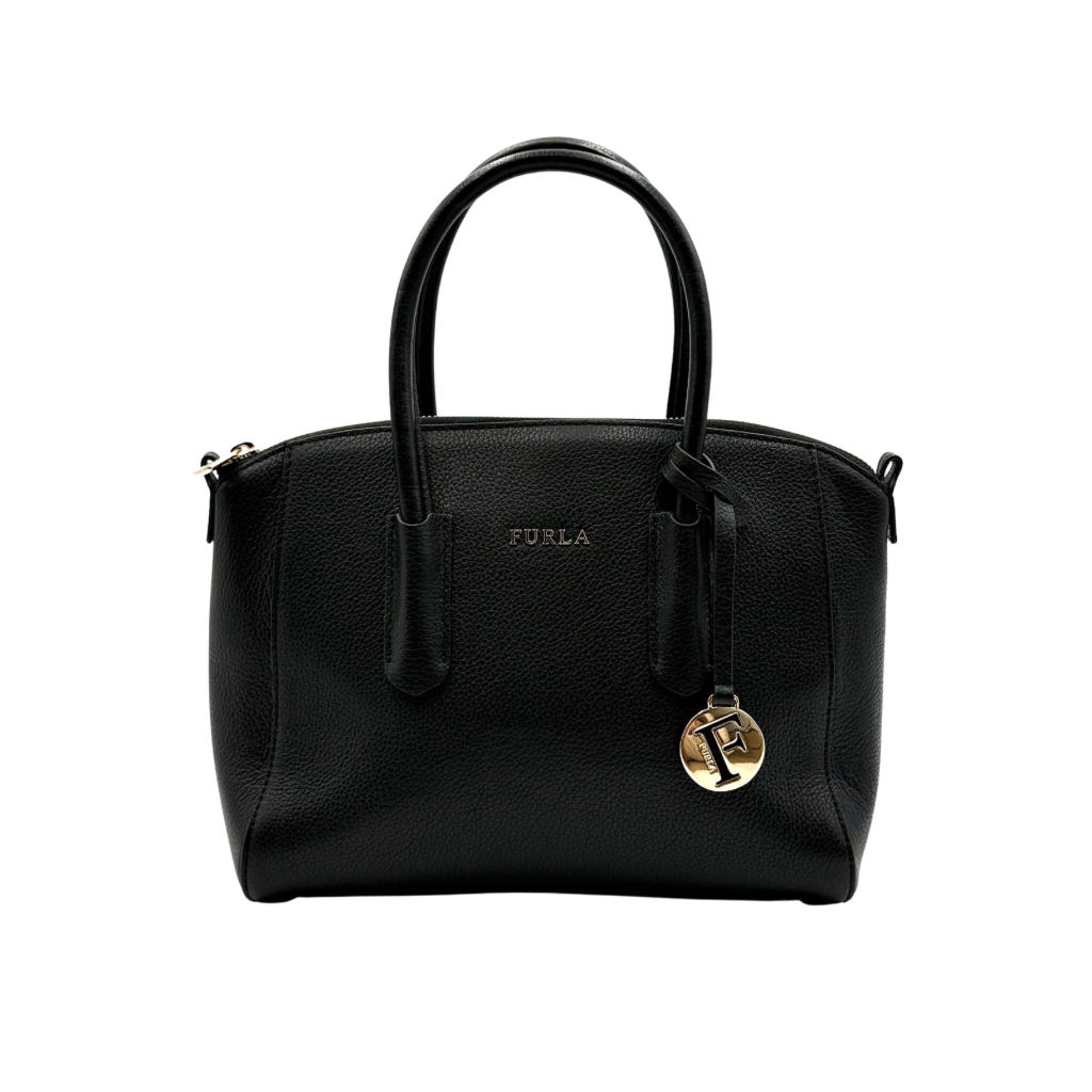Front view of the Furla Tessa black leather satchel with gold-tone Furla charm and structured silhouette.