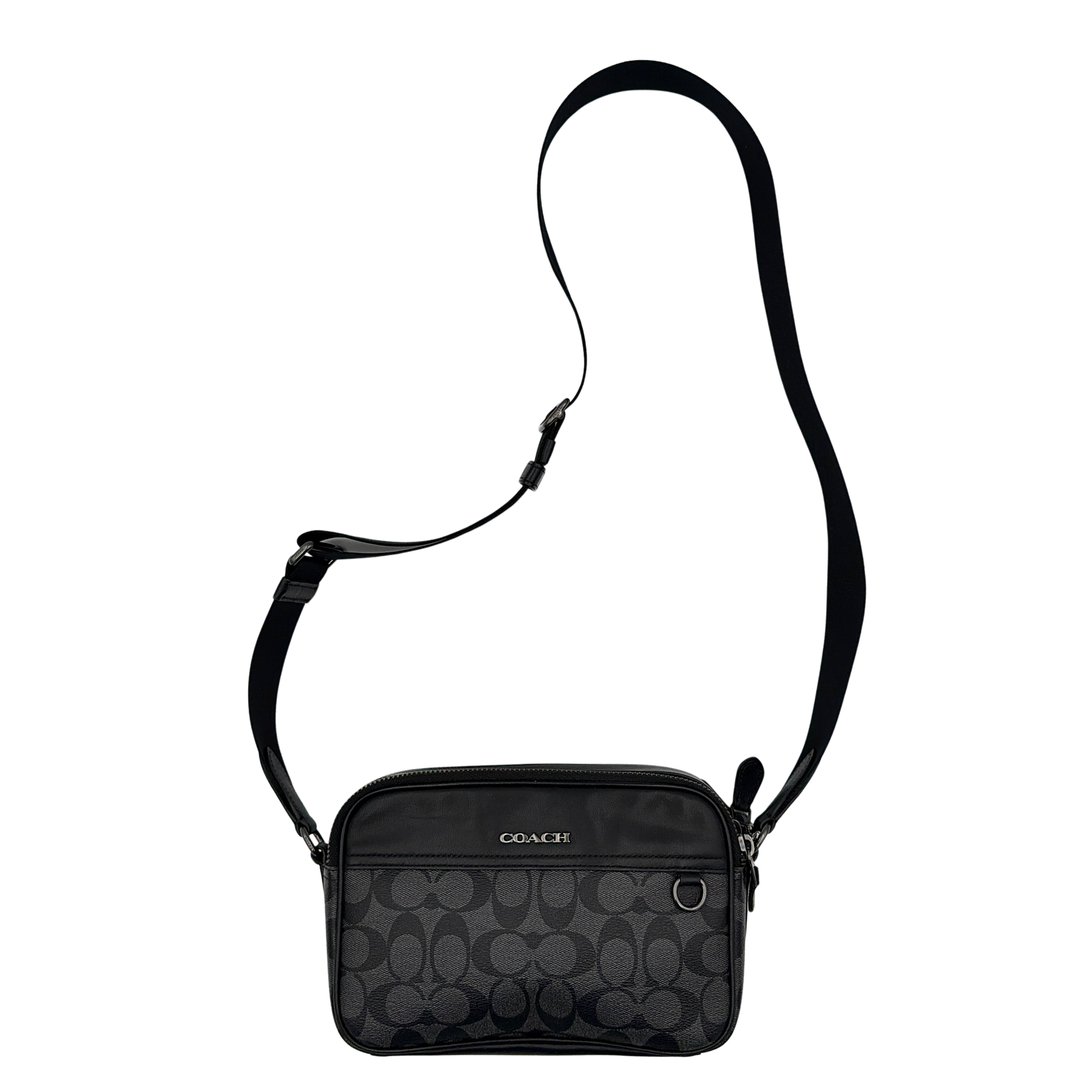 Coach Signature Graham Crossbody Bag in grey and black with adjustable web strap and silver-tone hardware, presented against a white background.