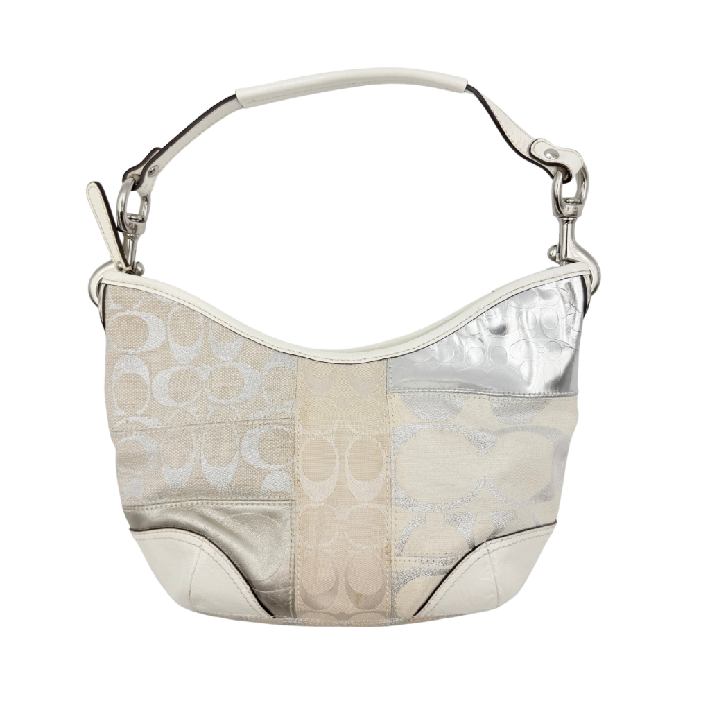 Coach Y2K Signature Patchwork Hobo Shoulder Bag in cream and silver jacquard with wide leather handle, shown on a white background.
