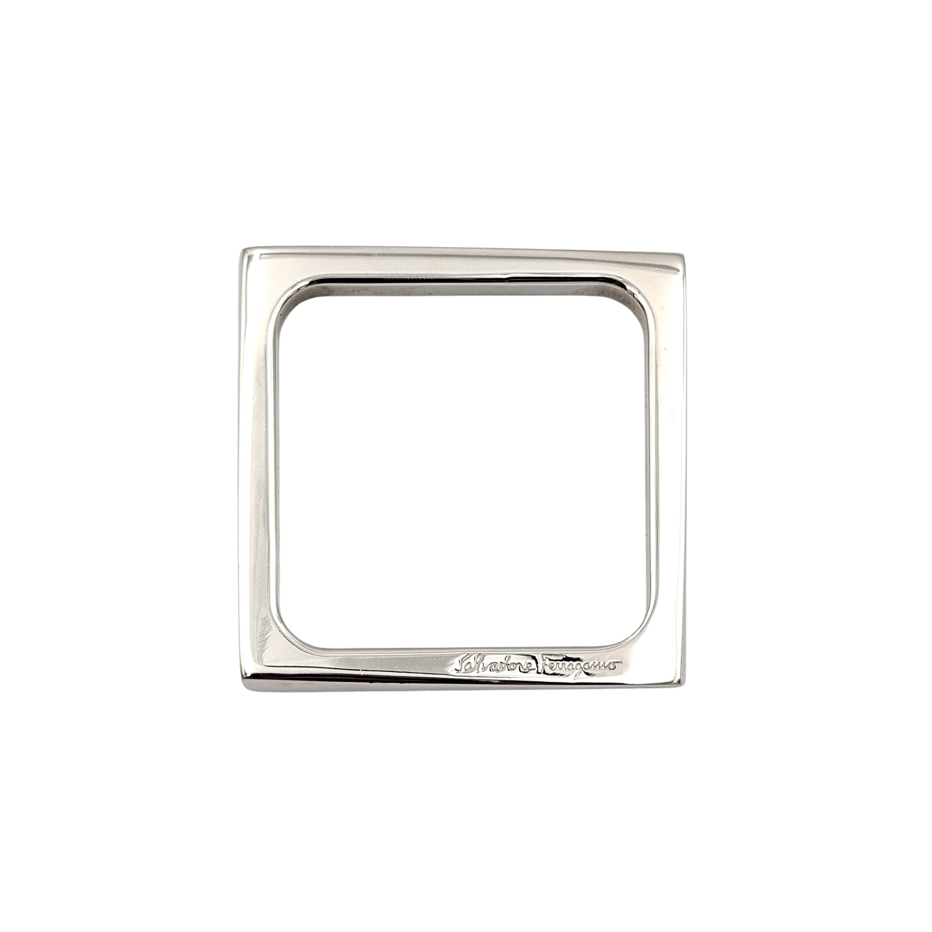 Salvatore Ferragamo square silver bangle bracelet with a crisp, minimalist silhouette and engraved logo.