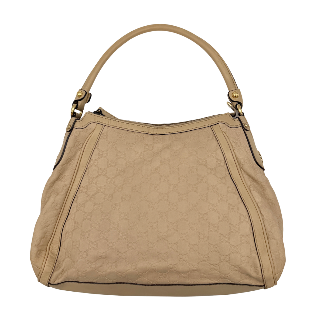 Gucci GG Monogram Guccissima Scarlett Shoulder Bag in beige embossed leather with gold hardware and single top handle.