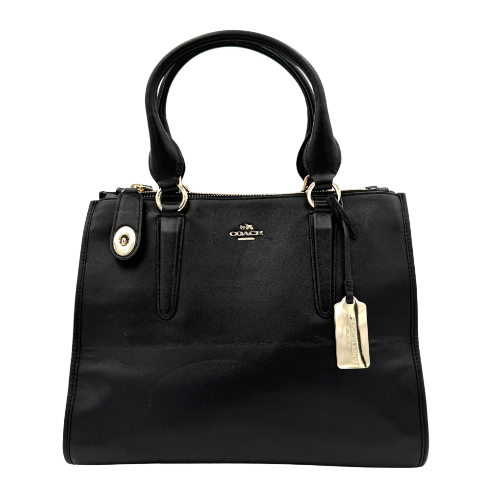 Coach Crosby Carryall Handbag in smooth black leather with gold-tone hardware and a structured silhouette.