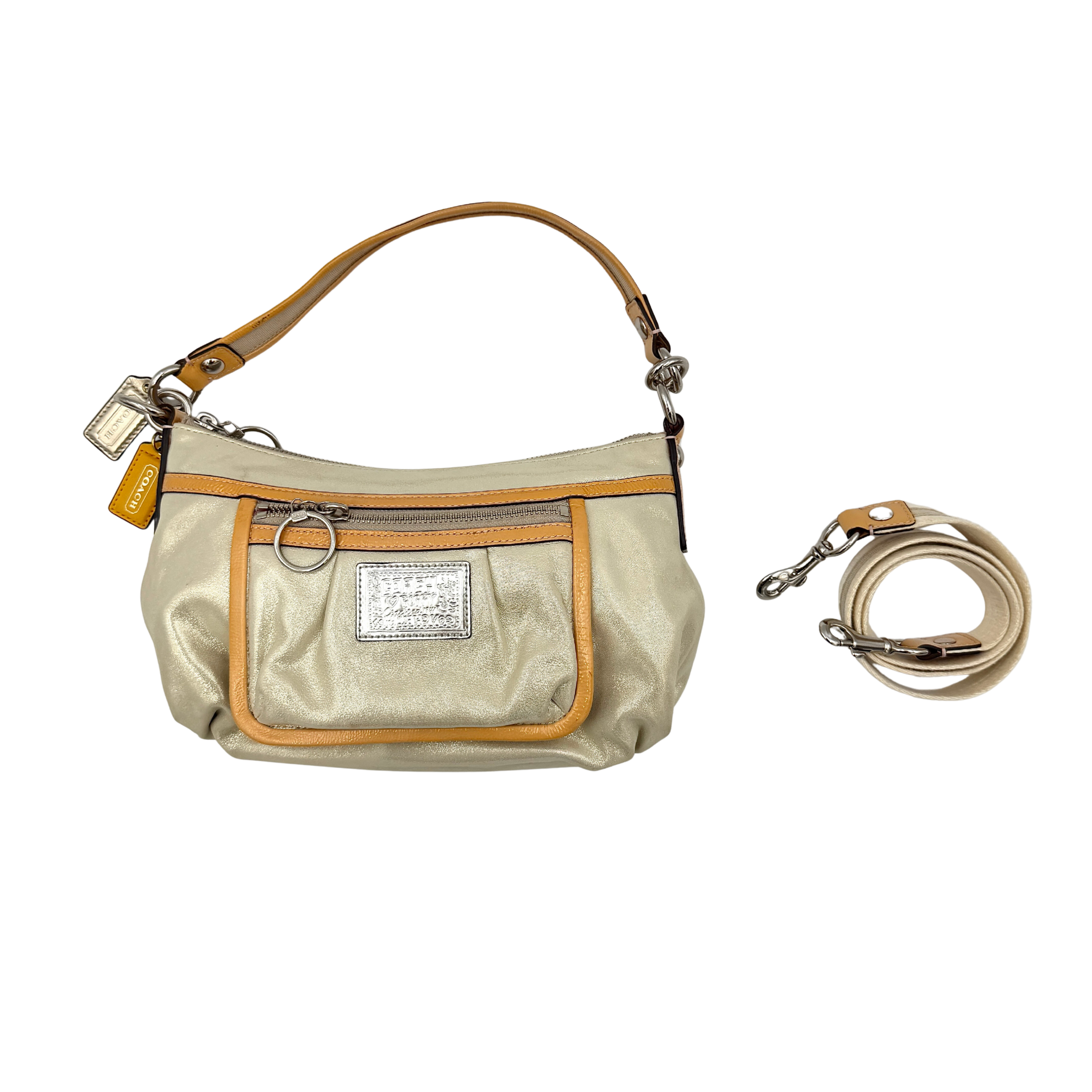 Coach Poppy Sparkle Groovy bag in cream with tan trim, metallic plaque, and detachable shoulder strap displayed alongside.