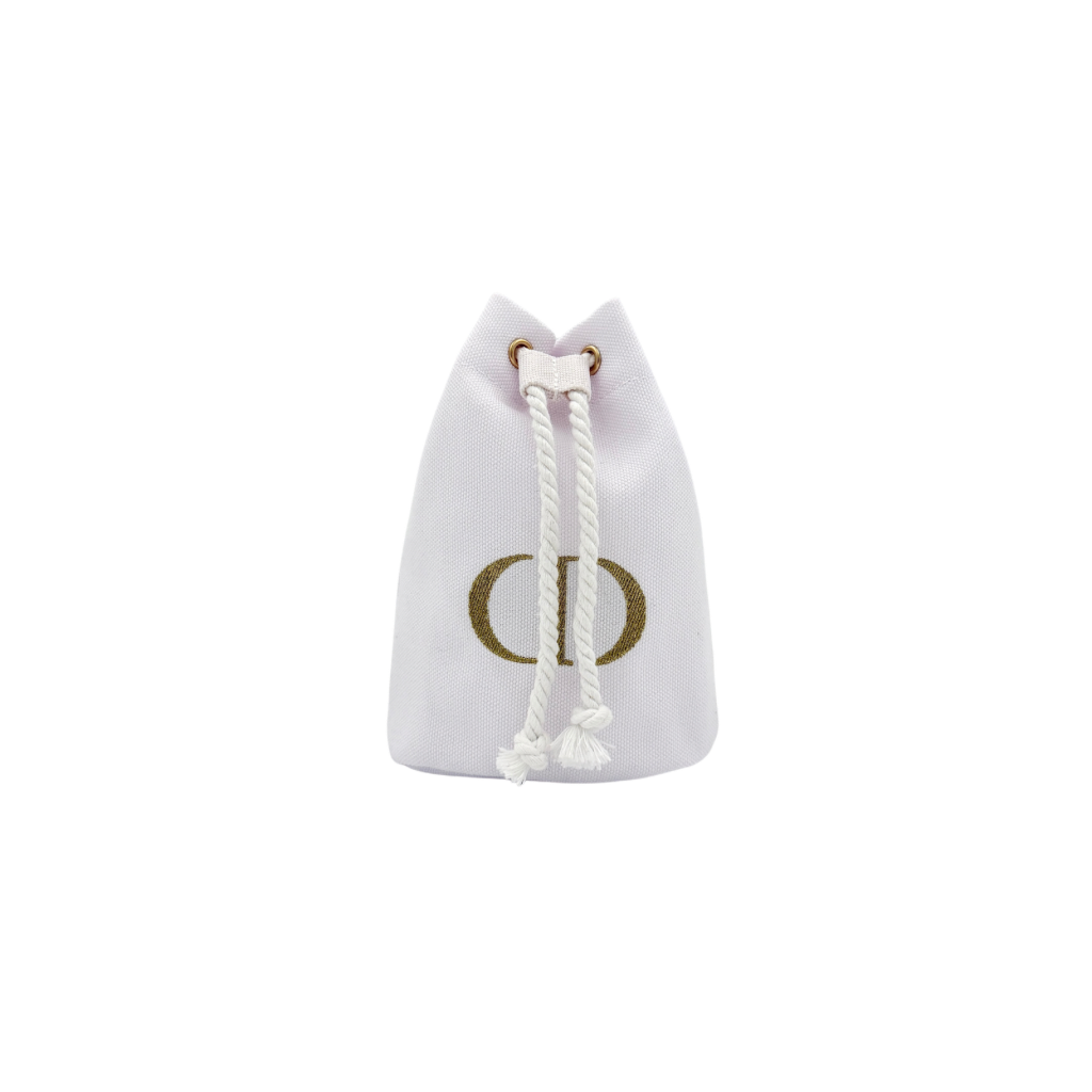 A structured white Dior drawstring pouch featuring a gold embroidered CD logo and white rope closure with gold-tone eyelets.