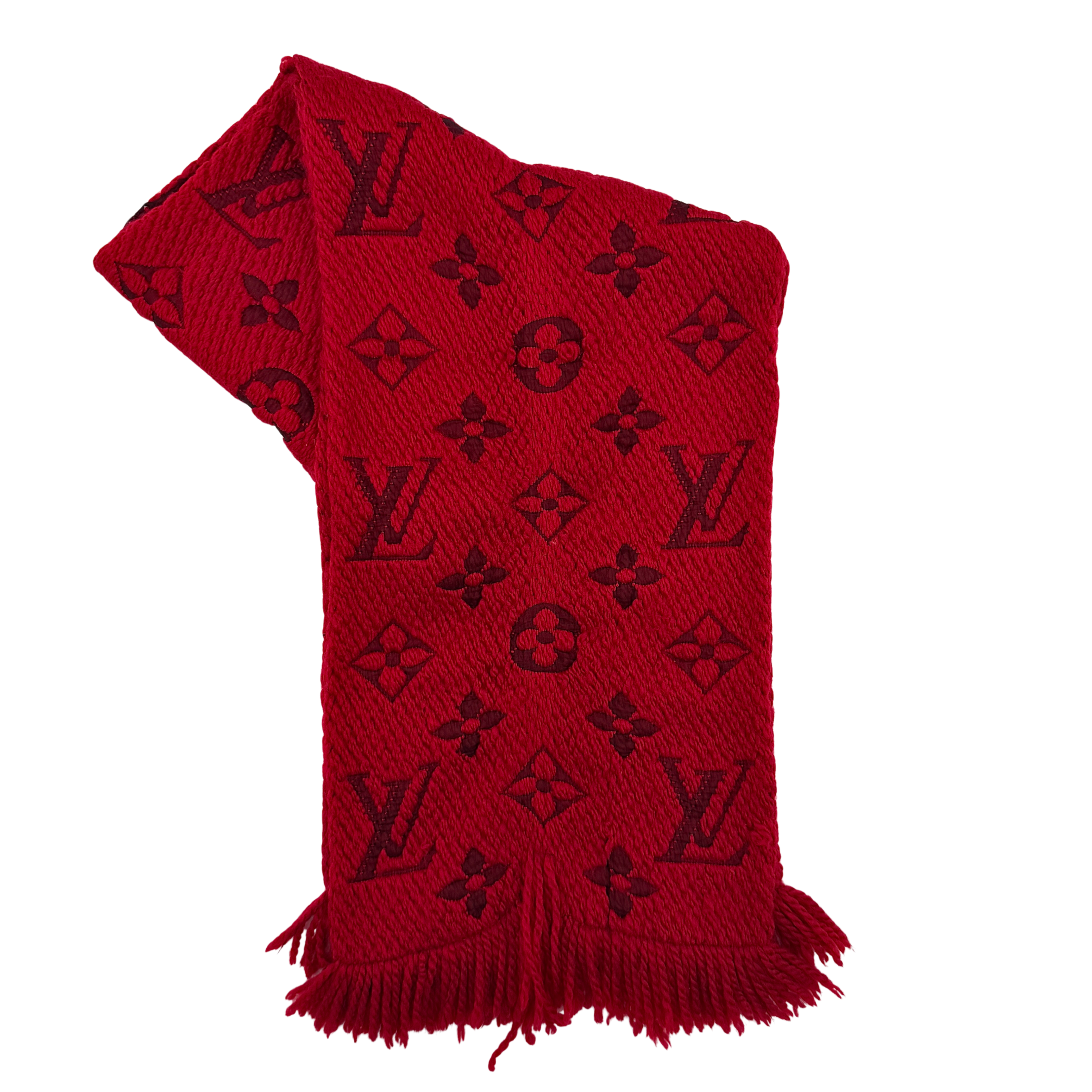 A luxurious Louis Vuitton Monogram Echarpe wool scarf in vibrant red, distinguished by its chunky texture, signature monogram pattern, and playful fringe edging.