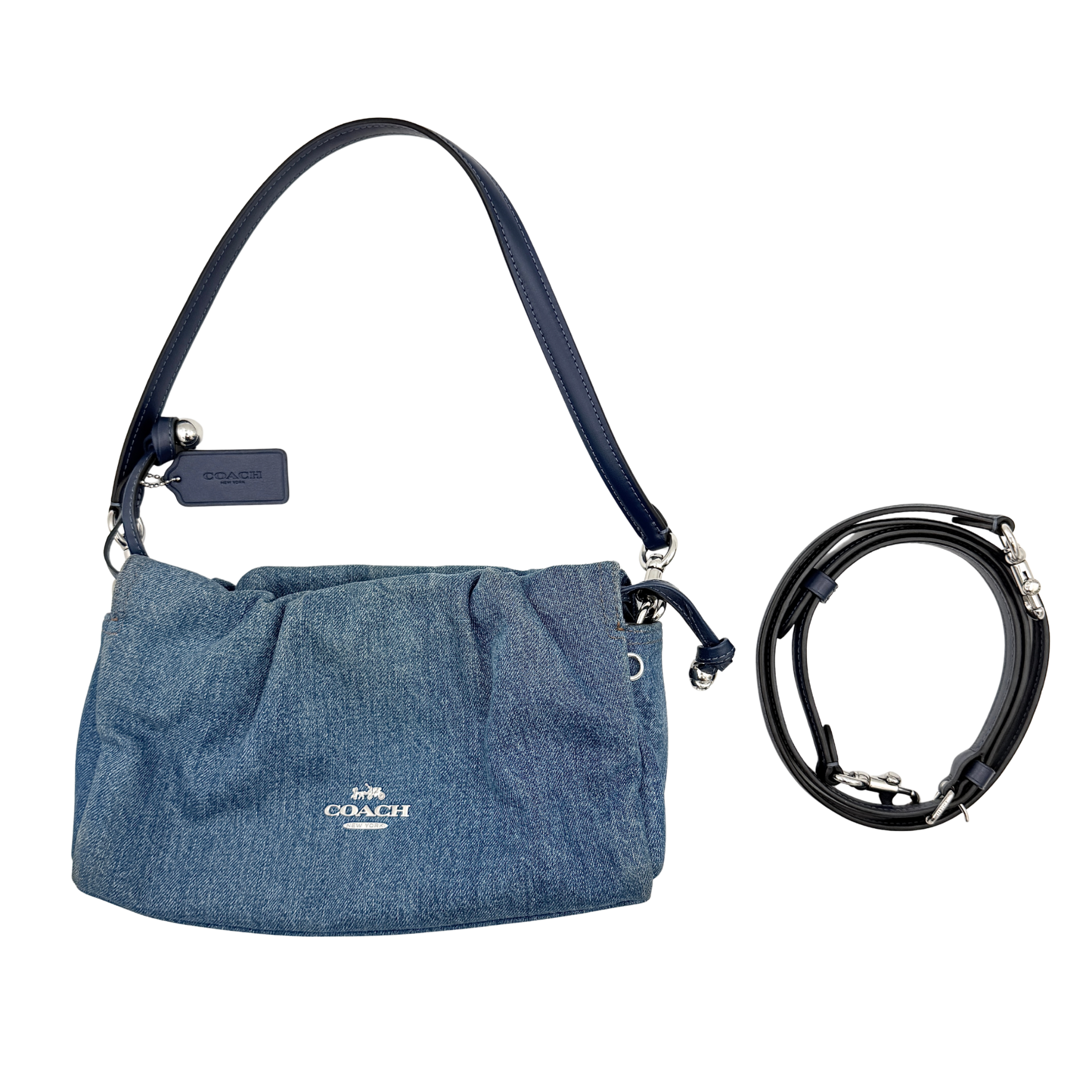 Coach Faye Shoulder Bag in blue denim with navy leather strap and detachable crossbody, styled simply against a white background.