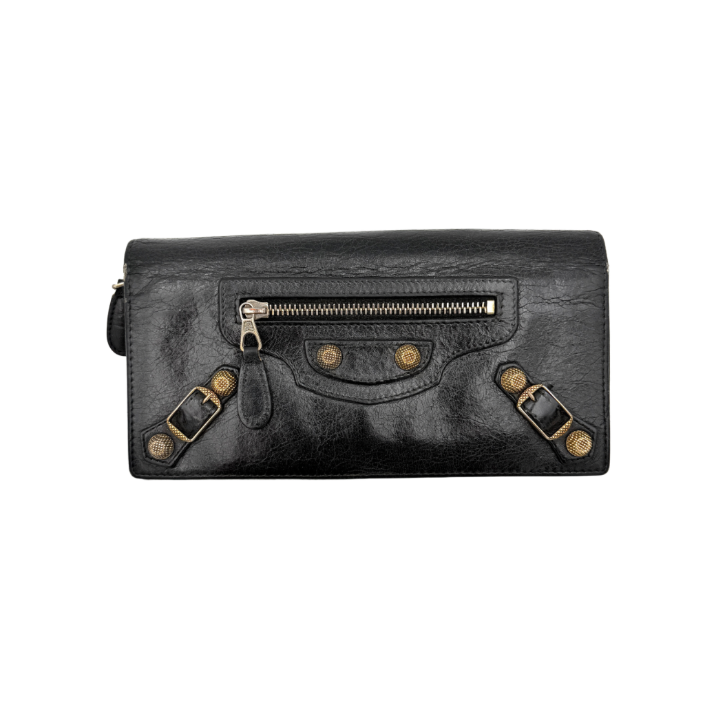Balenciaga Motorcycle Studded Long Wallet in black distressed leather with signature brass studs and buckle details.