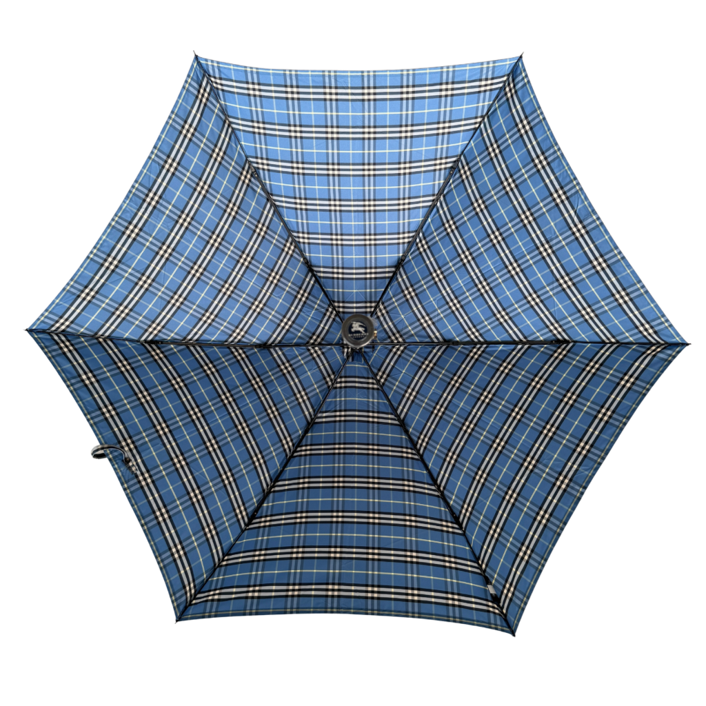 Burberry folding umbrella and matching pouch in blue Nova Check plaid, perfectly folded to showcase its classic pattern and refined finish.