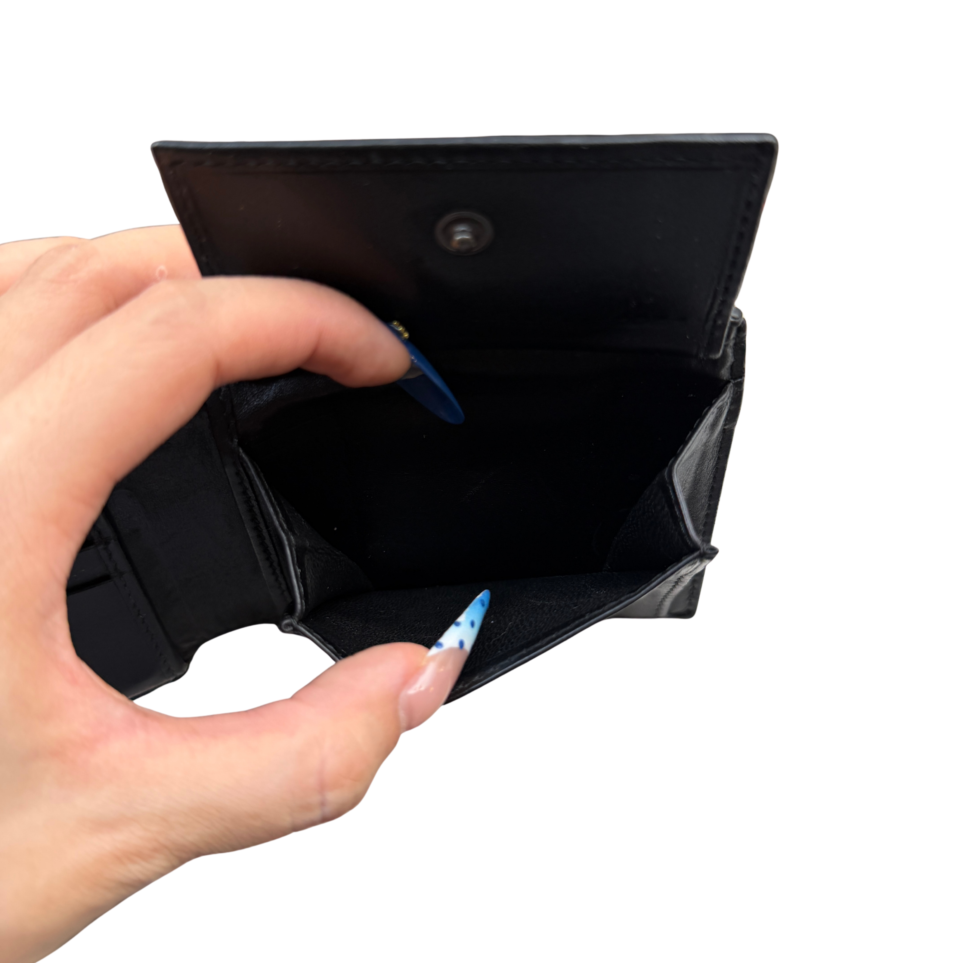Bottega Veneta Intrecciato wallet in black leather featuring the iconic woven design and a structured rectangular shape.