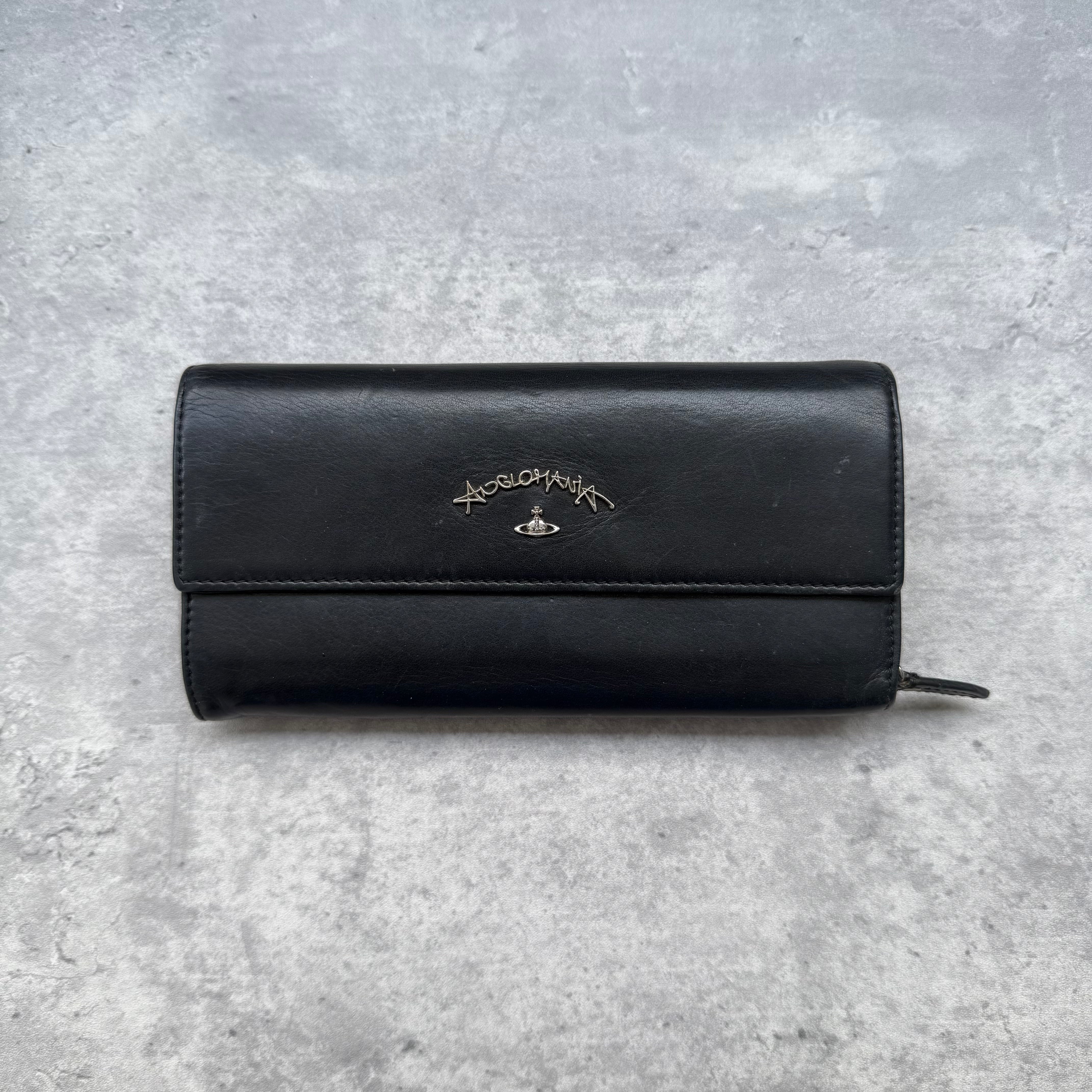 Vivienne Westwood Anglomania Orb Long Wallet Black, crafted in smooth black leather with silver-tone logo hardware and red interior lining.
