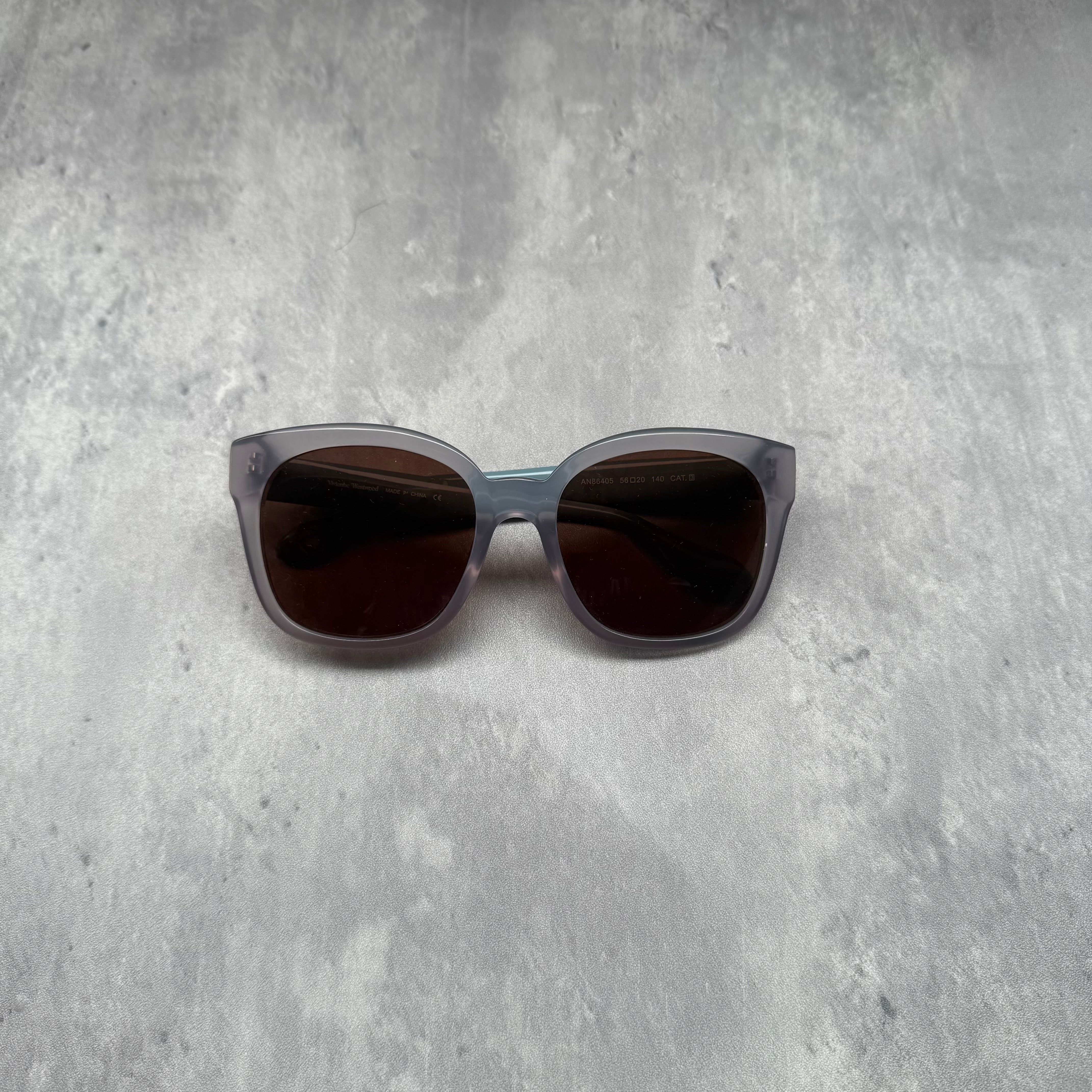 Vivienne Westwood Anglomania Stars Sunglasses in light blue with star-embossed temples and dark tinted lenses.