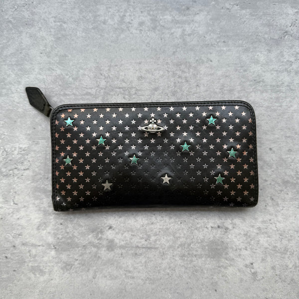 Vivienne Westwood Orb All-Over Star Long Wallet in black leather, featuring metallic star print design, signature Orb emblem, and zip-around closure with multiple compartments.