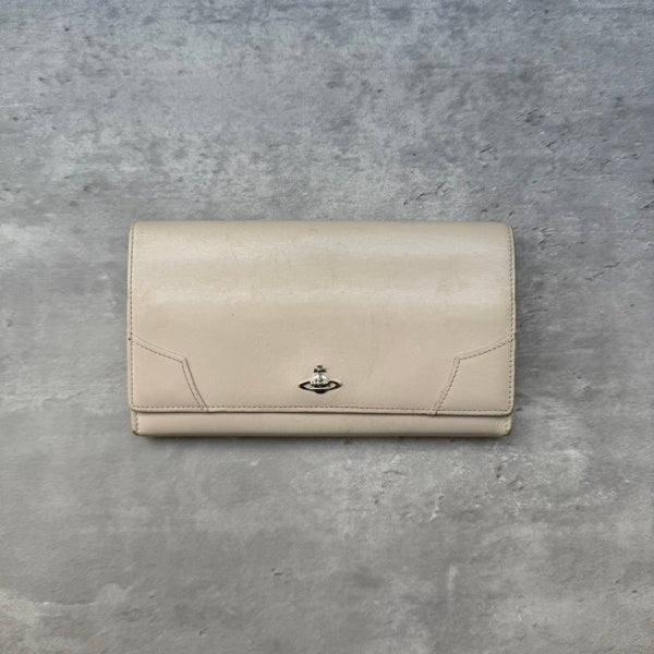 Vivienne Westwood Orb Long Wallet Cream leather with silver-tone Orb emblem and striped interior lining.