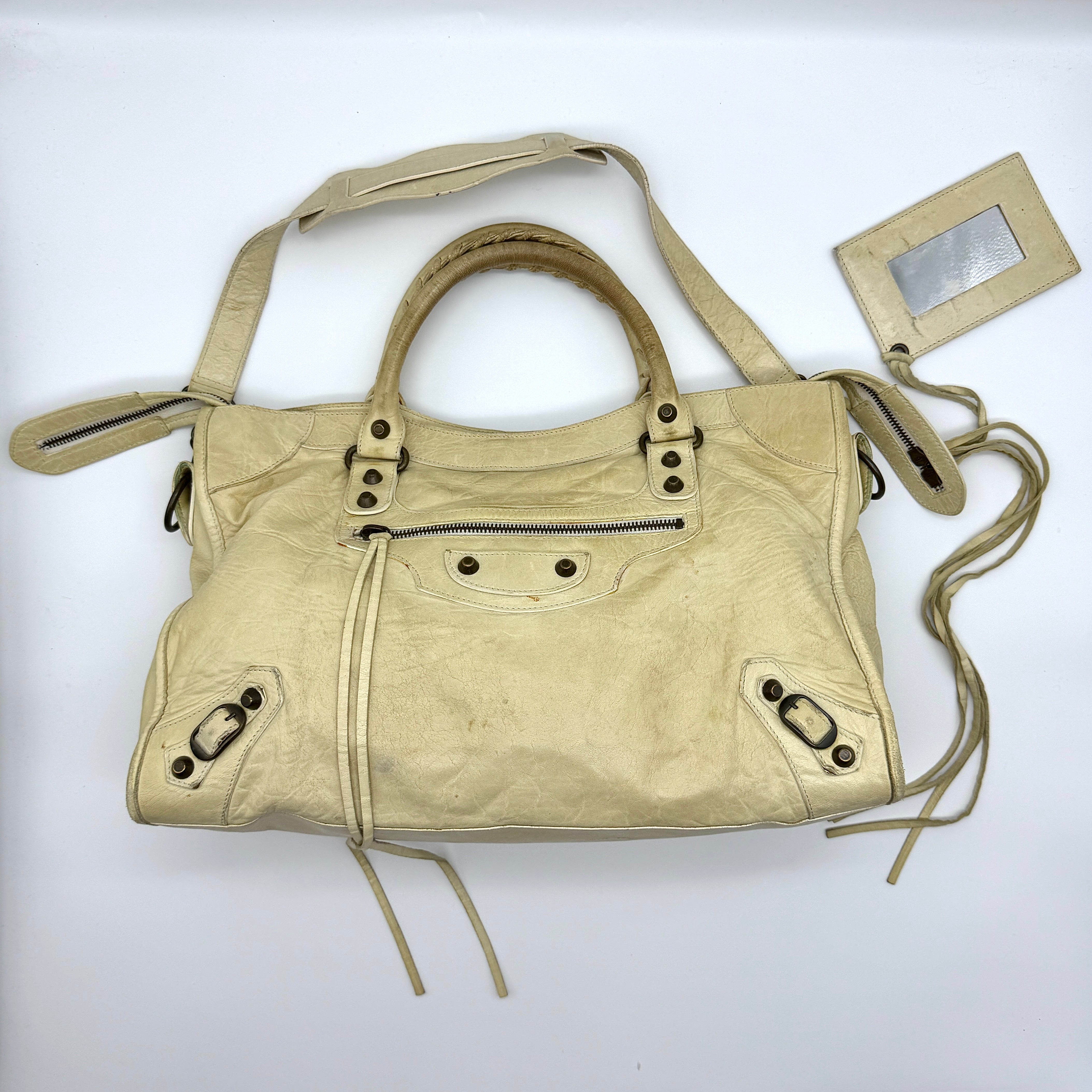 Balenciaga 2Way Agneau Leather Preloved Luxury Motorcycle City Bag in cream lambskin with antique brass hardware and detachable strap.