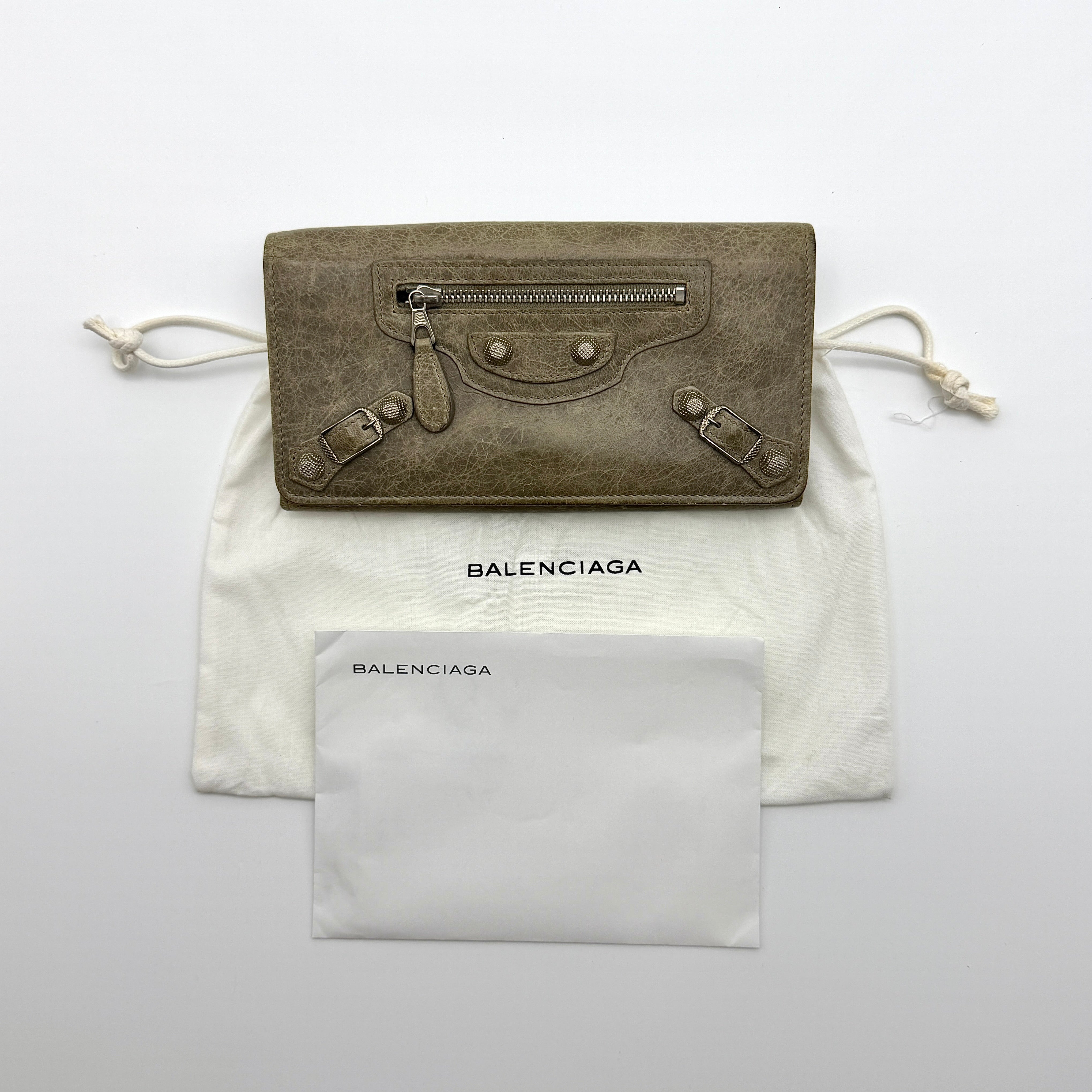 Balenciaga Agneau City Long Preloved Luxury Wallet in grey lambskin leather with silver-tone hardware and iconic zip pocket.