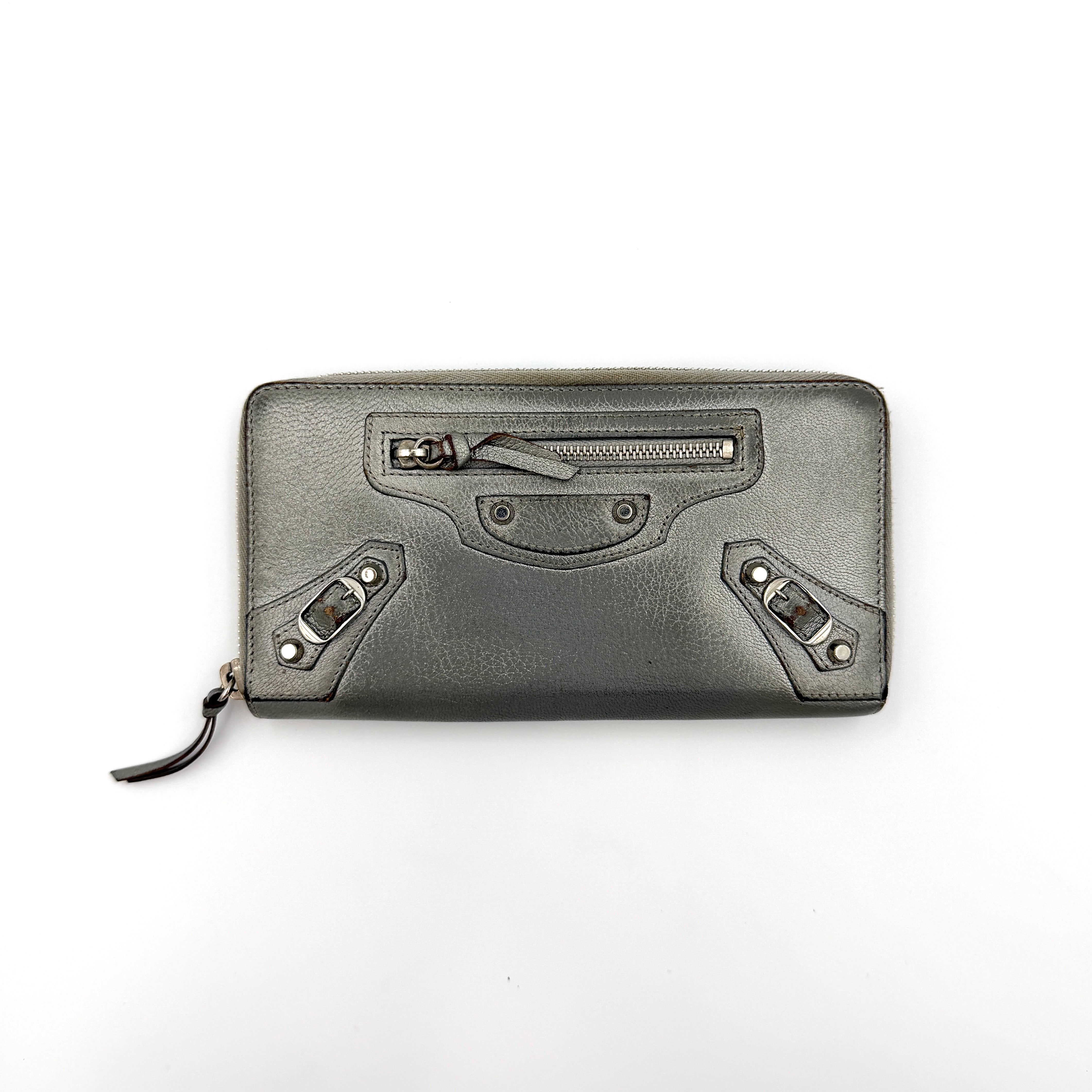 Balenciaga City Leather Long Wallet in metallic silver with signature hardware details and zip-around closure.