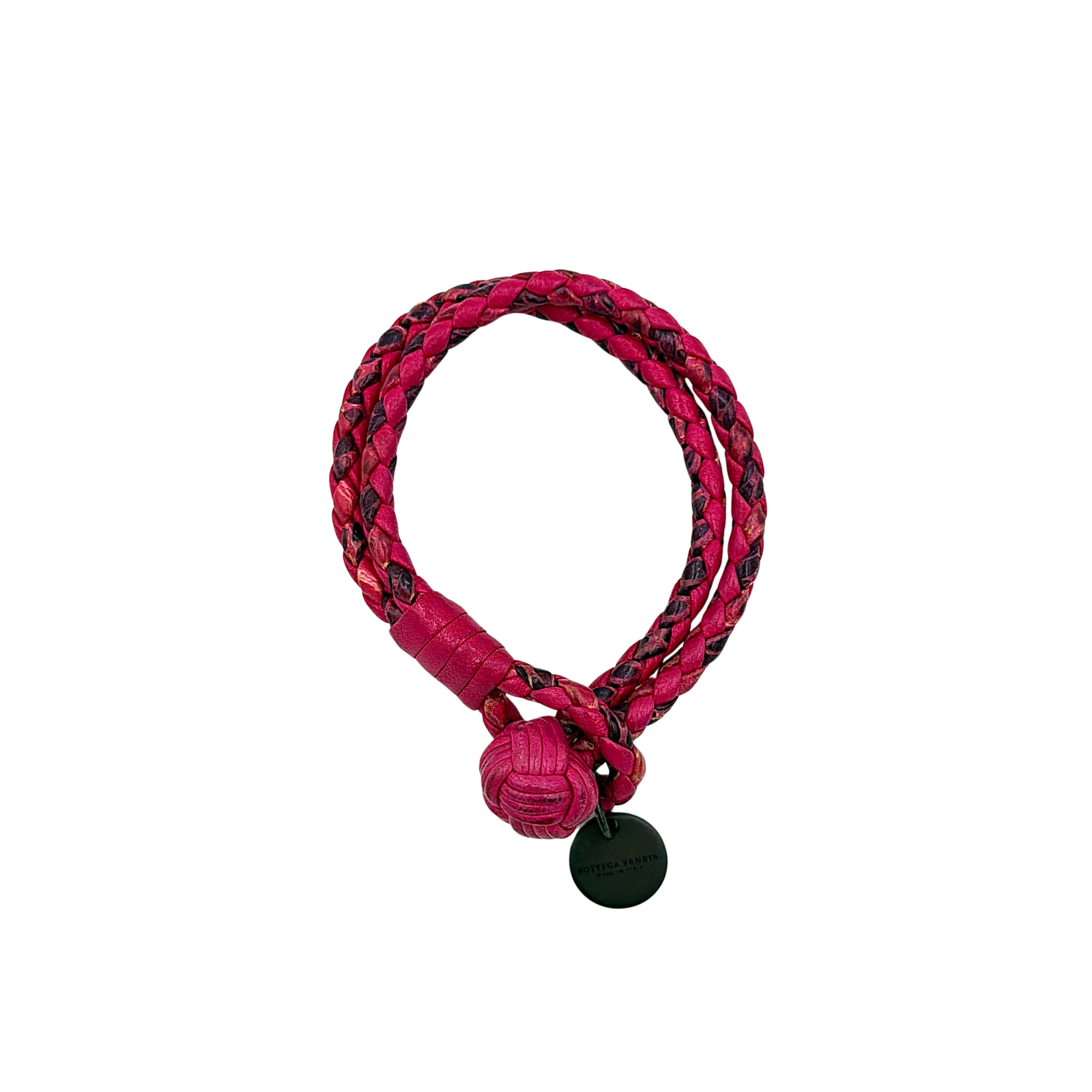 Bottega Veneta Intrecciato woven leather bracelet in fuchsia pink with signature knot detail and hanging logo charm tag.
