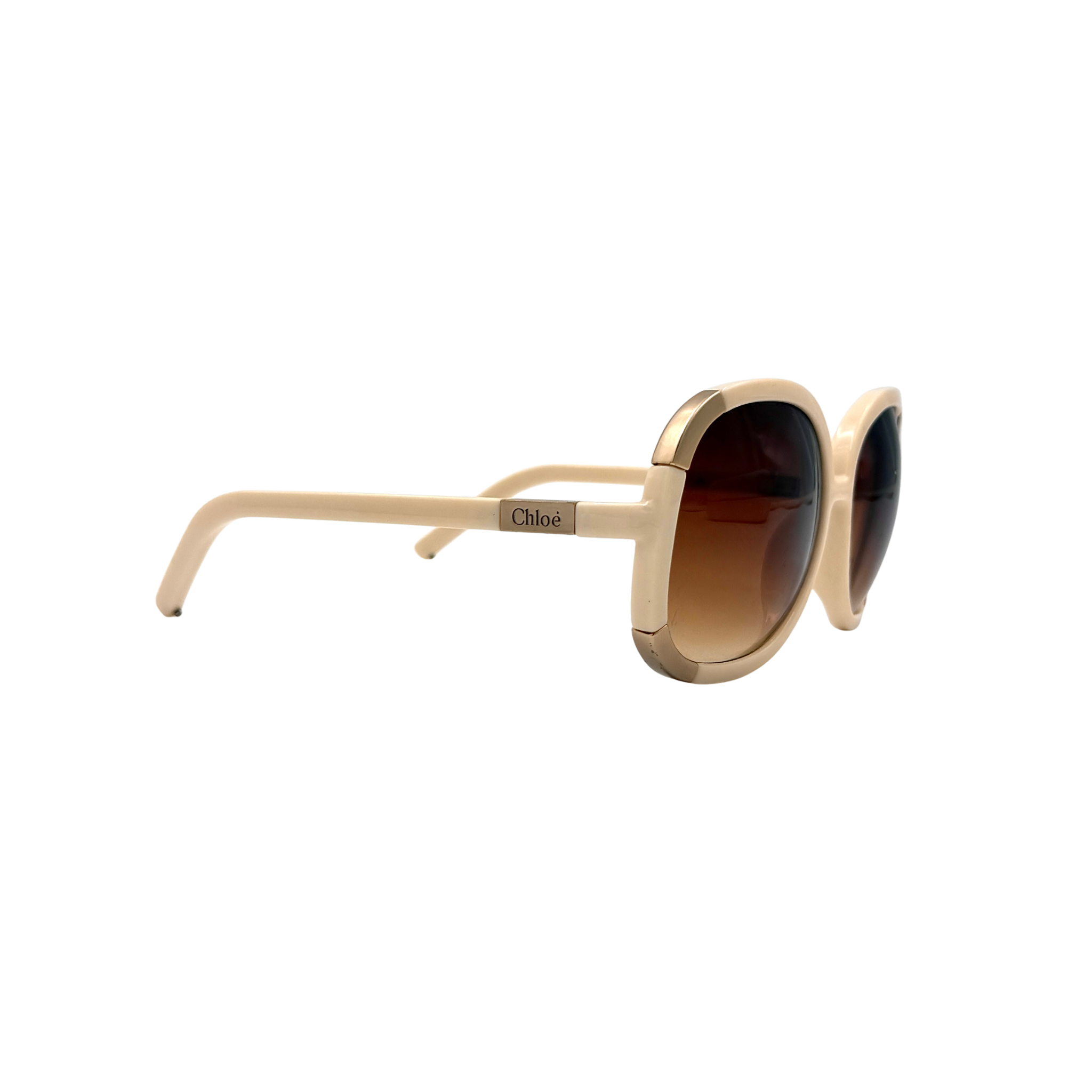 Chloé CL2119 sunglasses in ivory with oversized rounded frames and gradient lenses, shown with Chloé case and box.
