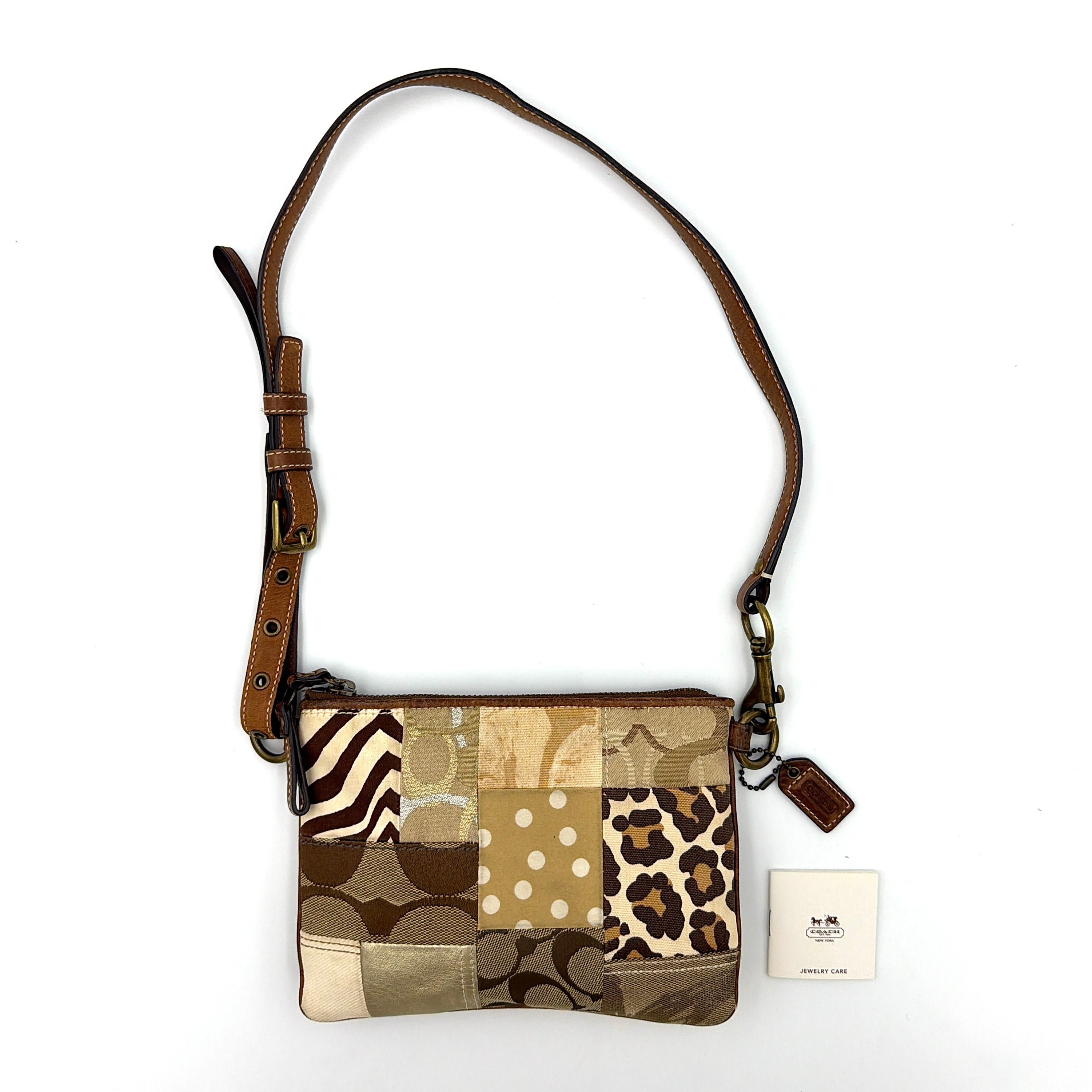 Coach 2Way Signature brown patchwork leopard shoulder bag with adjustable strap and distinctive patterns in polka dot and leopard print.