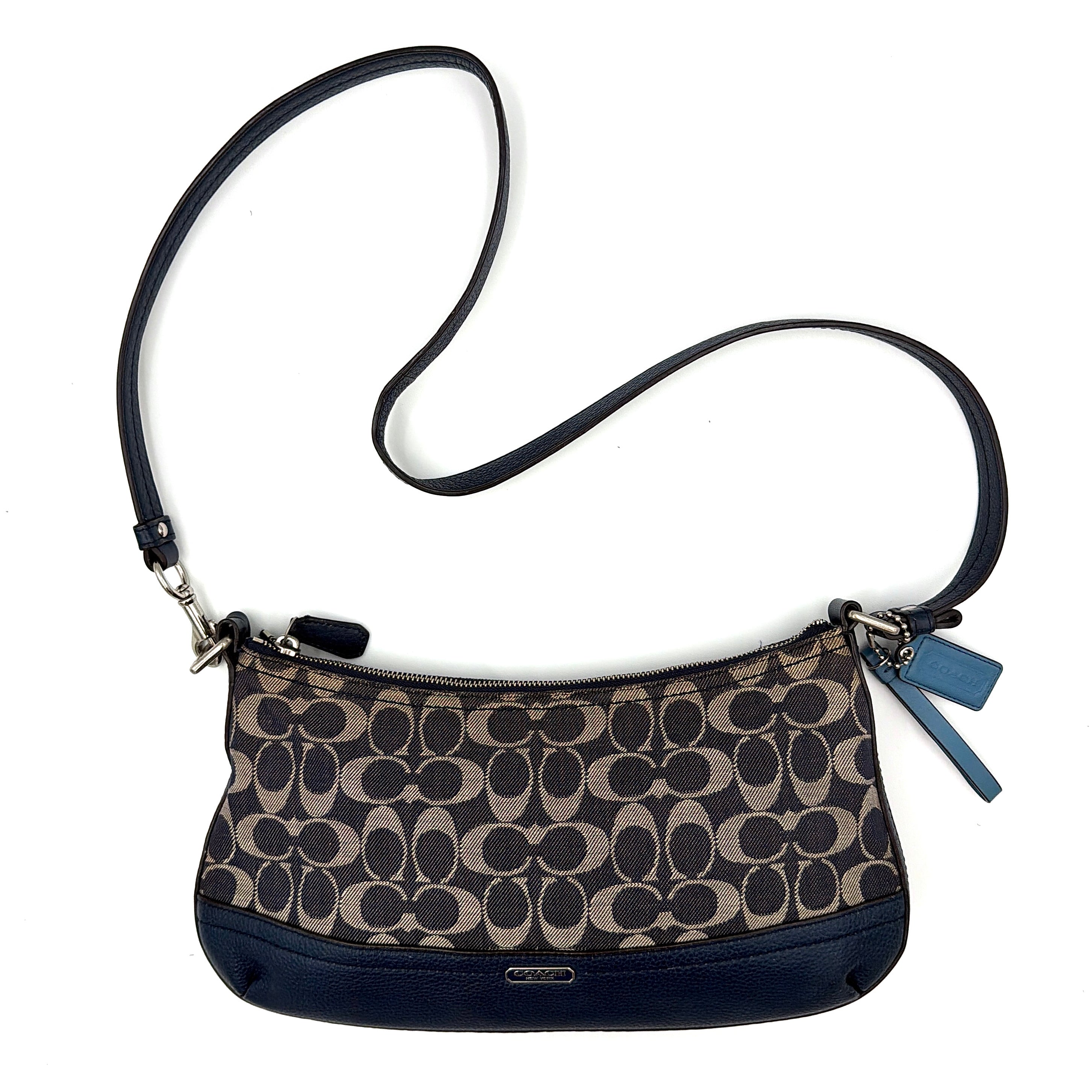 Coach 2Way Signature Denim Crossbody Bag in blue with signature pattern and adjustable strap for versatile wear.
