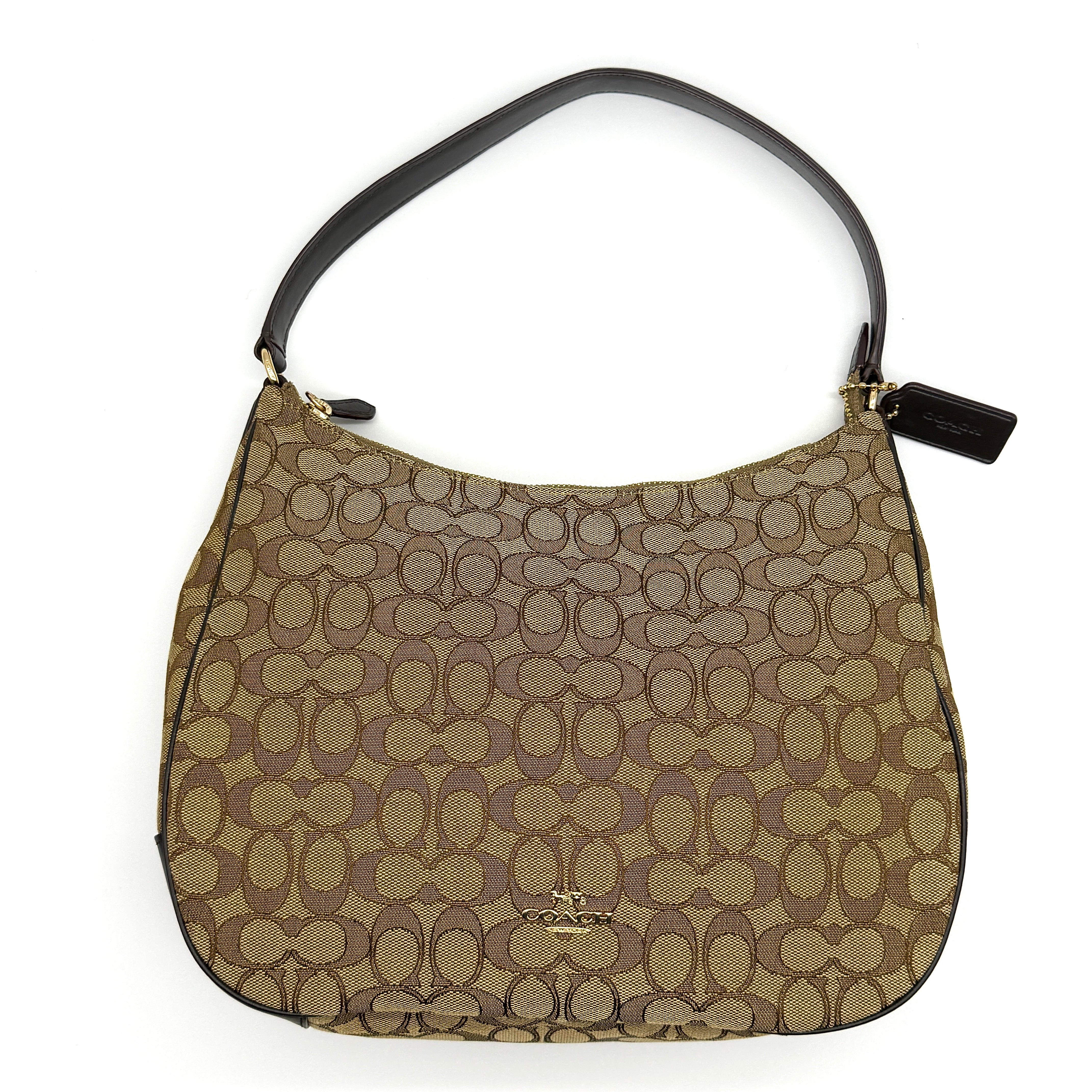 Coach Signature Hobo Canvas Shoulder Bag in beige and brown with black leather trim and gold-tone hardware.