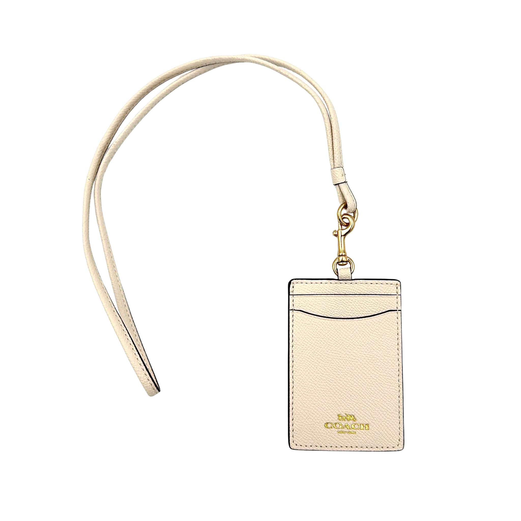Coach signature ID cardholder lanyard in white with gold-tone clip hook and front card slot, shown on strap with close-up branding.
