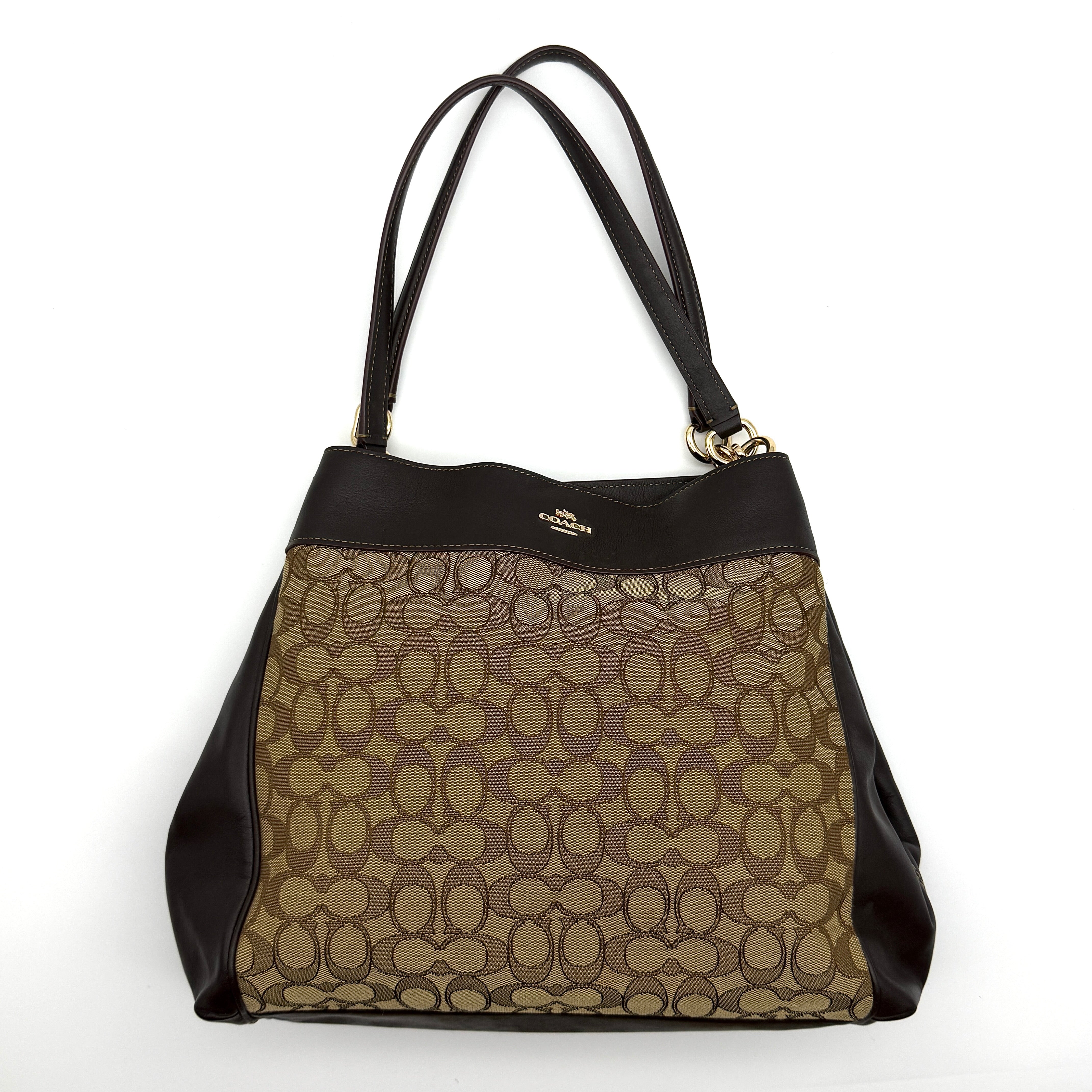 Coach Signature Lexy Canvas Shoulder Bag in beige and brown with leather trim and gold-tone hardware, pre-loved luxury bag.