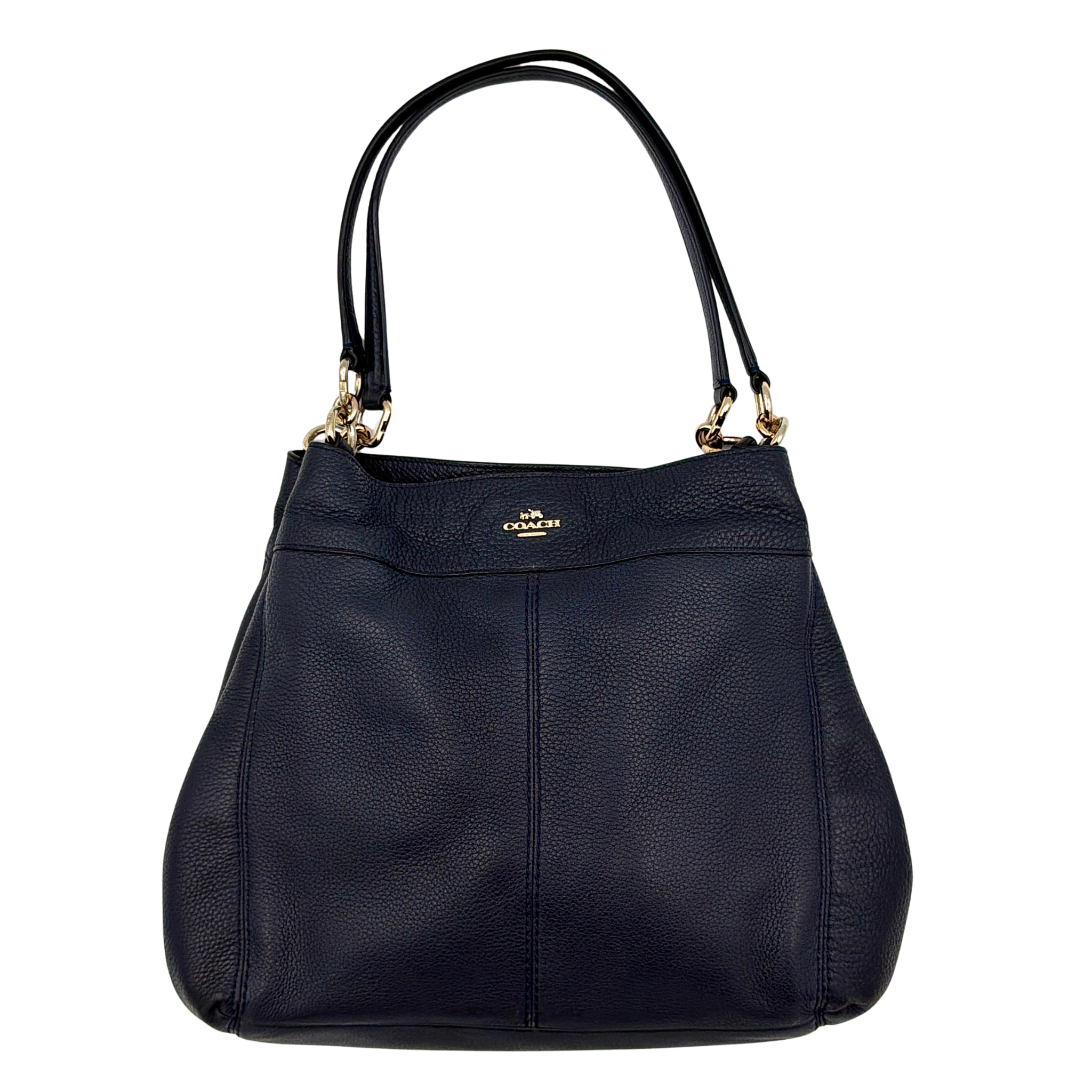 Coach Lexy shoulder bag in black pebbled leather featuring gold-tone hardware, double shoulder straps, subtle Coach logo, and a softly structured silhouette.