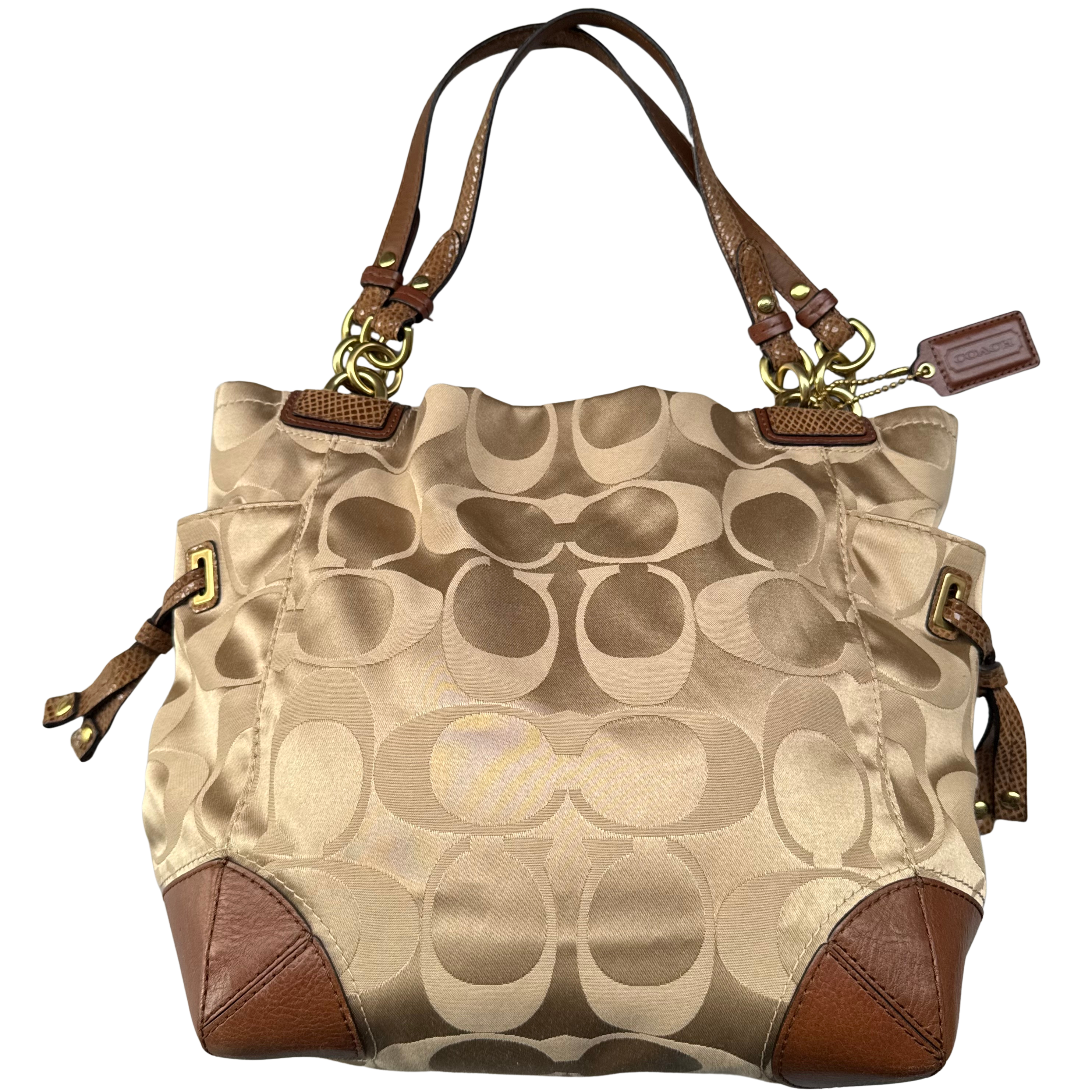 Coach Signature Peyton hobo shoulder bag in beige and brown jacquard canvas with leather trim and gold-tone hardware