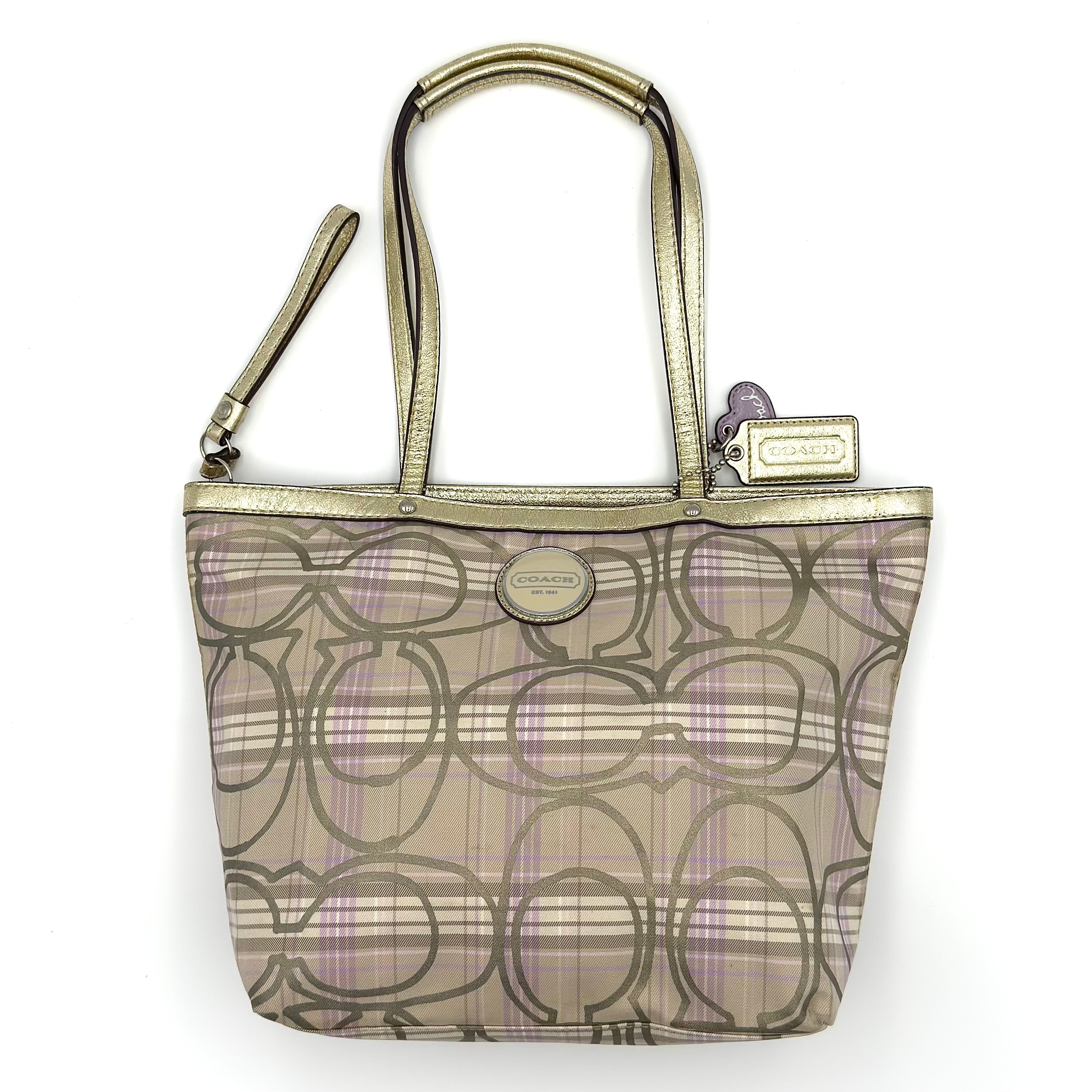 Coach Signature Plaid Tartan Tote Bag in purple/gold with metallic trim, gold-tone hardware, signature tartan-style pattern, and spacious zippered interior.