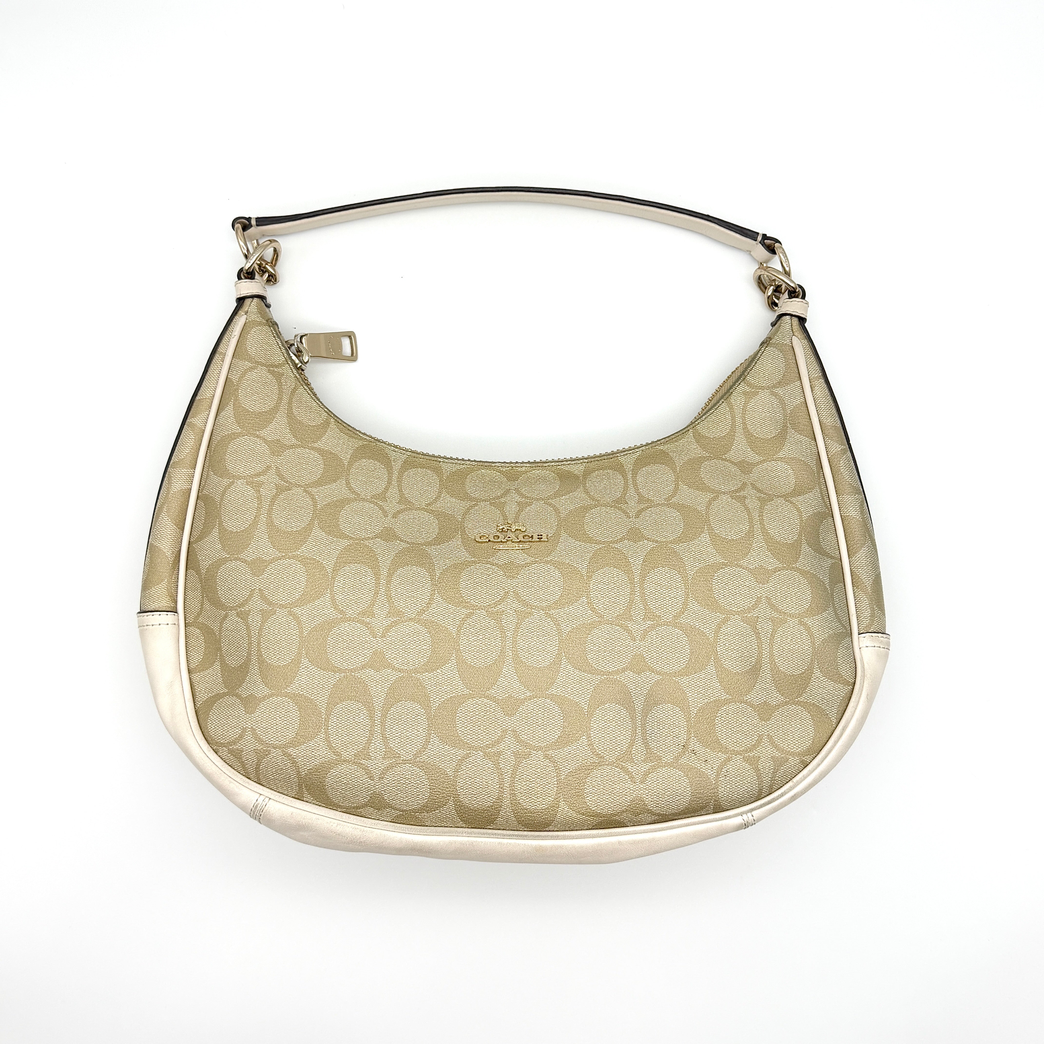 Coach Signature PVC Hobo Shoulder Bag in beige and white with gold-tone hardware and brown fabric lining.