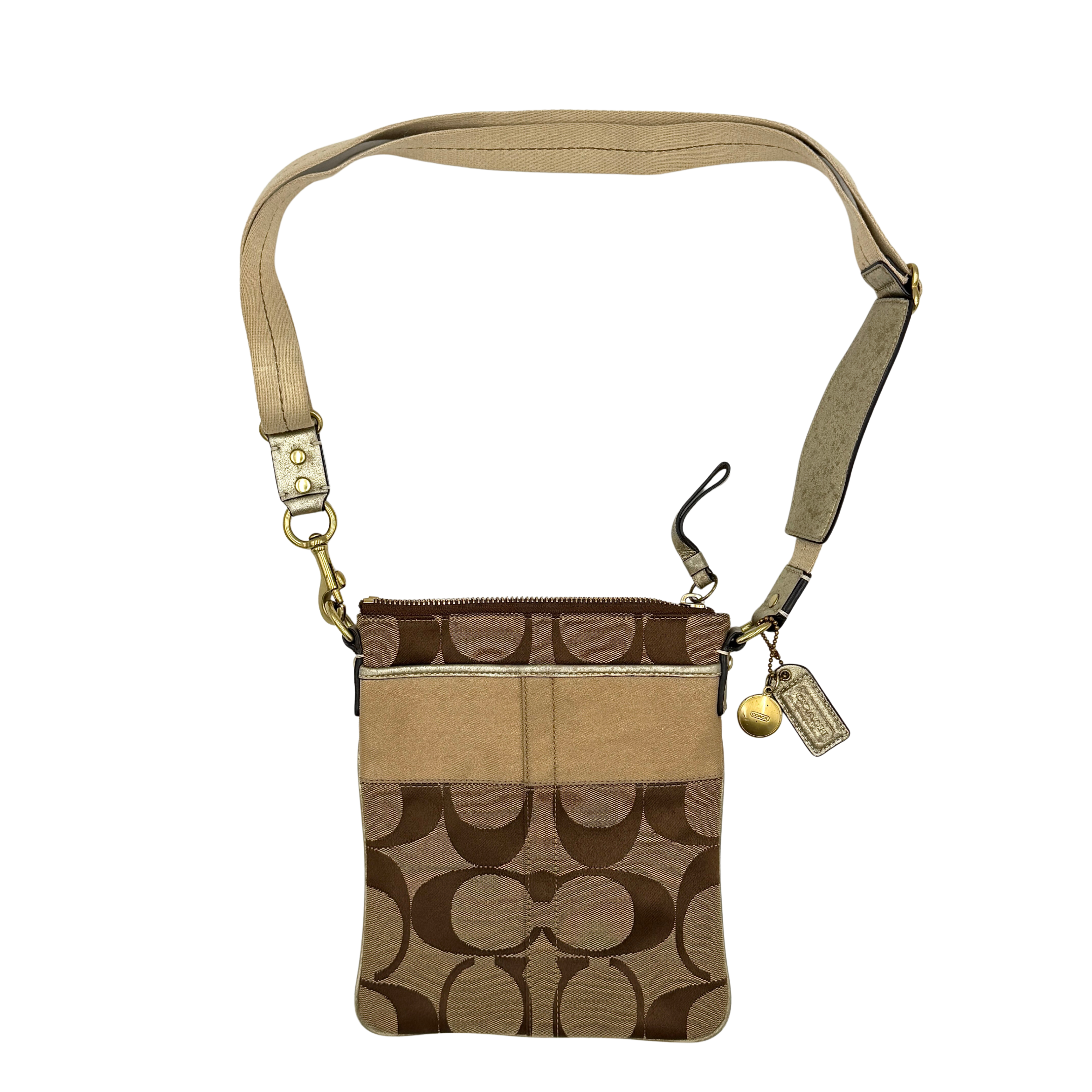 Coach Signature Stripe Canvas Crossbody Bag in beige and tan, featuring iconic monogram design and adjustable strap.