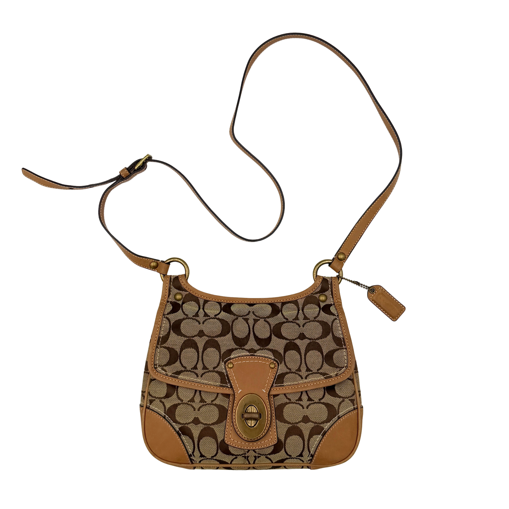 Coach signature turnlock crossbody bag in tan and beige featuring signature canvas, leather trim, front flap with turnlock closure, and adjustable strap.