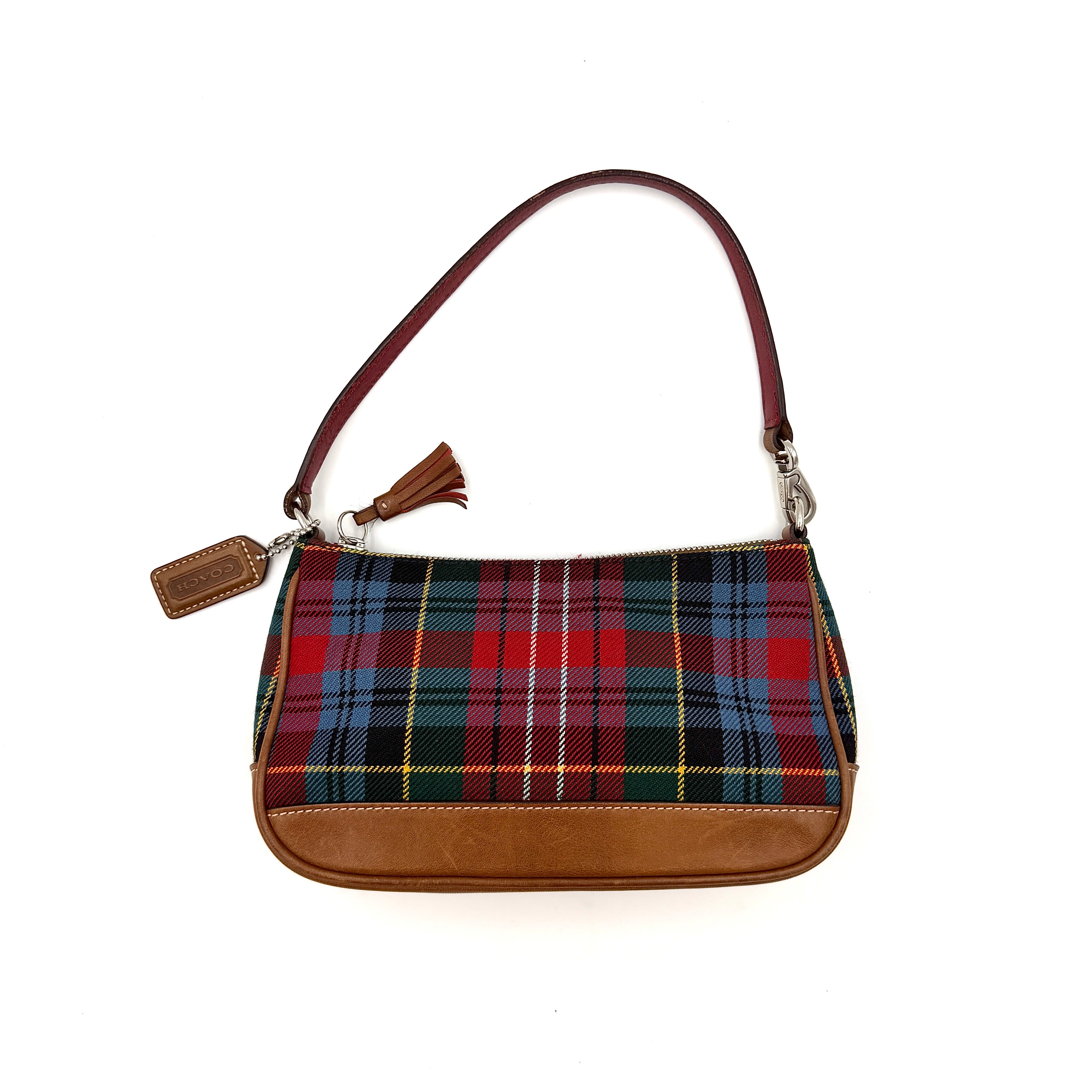Coach Y2K plaid demi shoulder bag in vibrant multicolor with a single strap and neutral trim, showcasing a playful yet refined design.